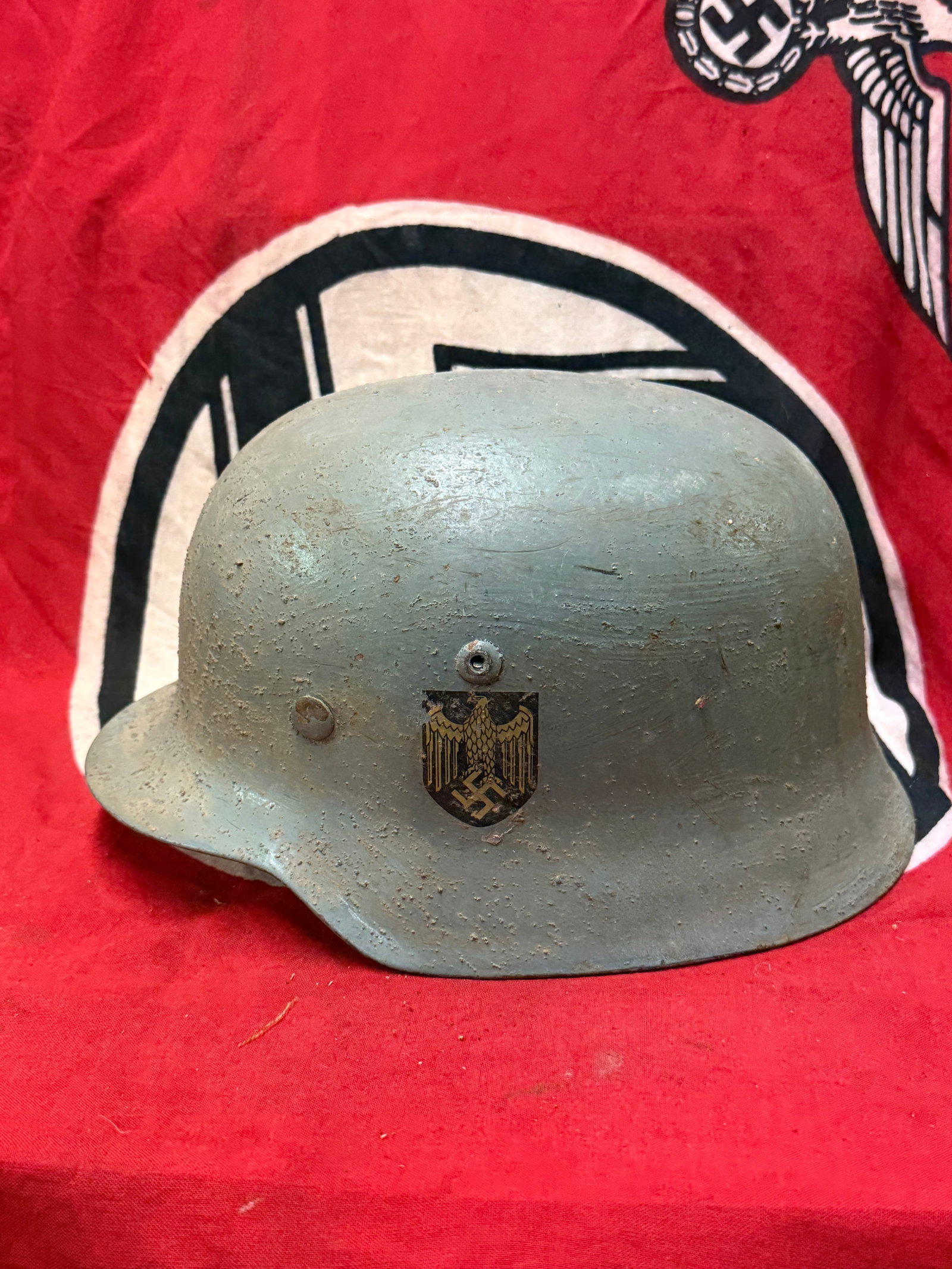 WW2 German Stahlhelm Modell 1935 Steel helmet pattern 1935/40 Wehrmacht with maker mark: WW2 German Stahlhelm Modell 1935 Steel helmet pattern 1935/40 Wehrmacht with maker mark. An ultra rare find that is in mint overall shape and condition with a beautiful overall patina. Shows good wear