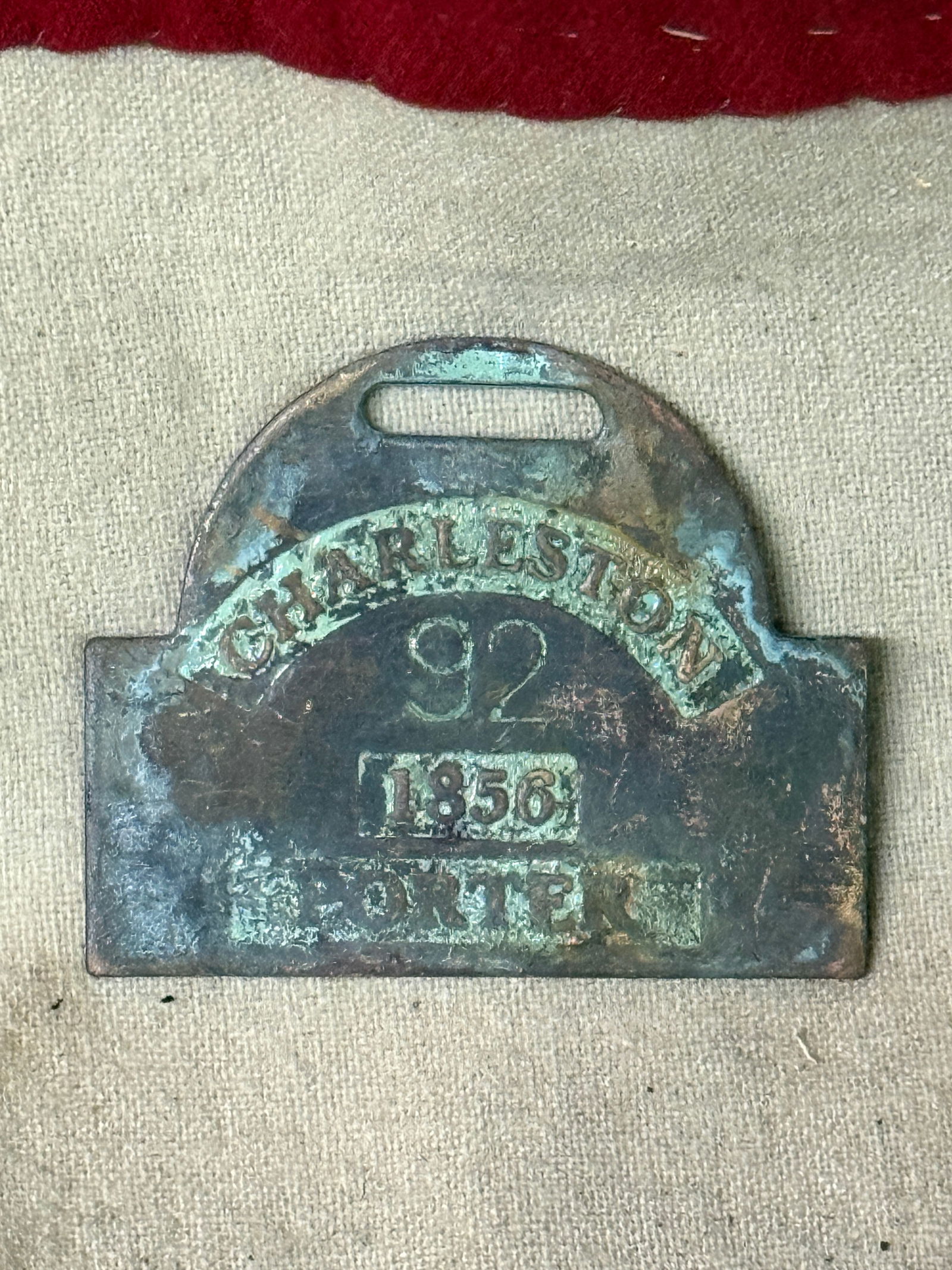 DATED 1856 CHARLESTON #92 PORTER SLAVED TAG SERVANT ID: DATED 1856 CHARLESTON #92 PORTER SLAVED TAG SERVANT ID. AN ULTRA RARE FIND THAT IS IN MINT OVERALL SHAPE AND CONDITION WITH A BEAUTIFUL OVERALL PATINA. SHOWS GOOD WEAR AND USE. PLEASE VIEW ALL DETAILE