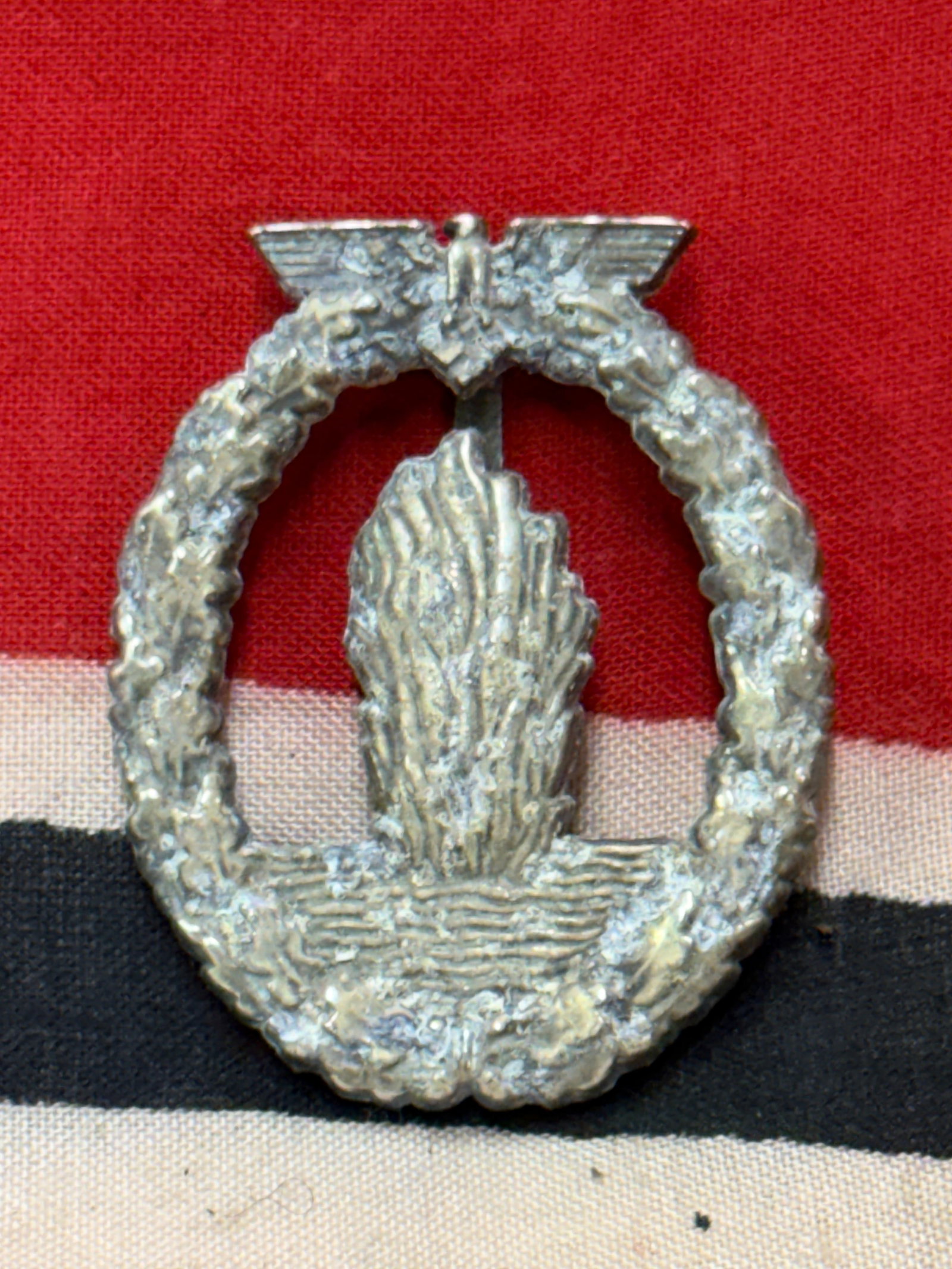 German WWII Minesweeper Badge By R.S.: German WWII Minesweeper Badge By R.S. Constructed in tombak with a beautiful patina throughout. Shows good wear and field use. Please view all detailed pictures. A rare example of the time period.