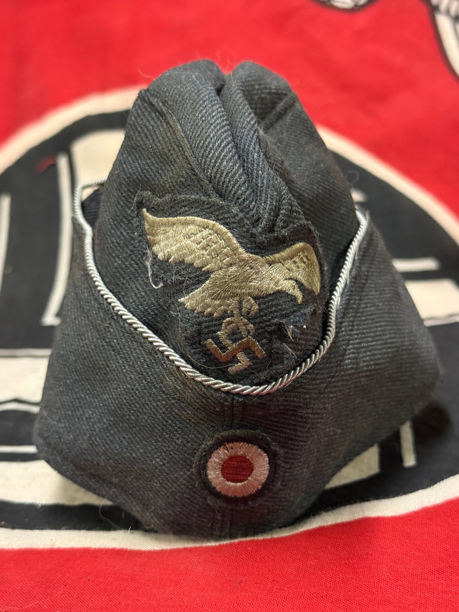 WW2 German Luftwaffe Officer’s Overseas Cap - Maker Marked: WW2 German Luftwaffe Officer’s Overseas Cap - Maker Marked. This Luftwaffe Officer’s Overseas Cap is an attractive piece, that was worn during the war. It’s a tailor made, private purchase style