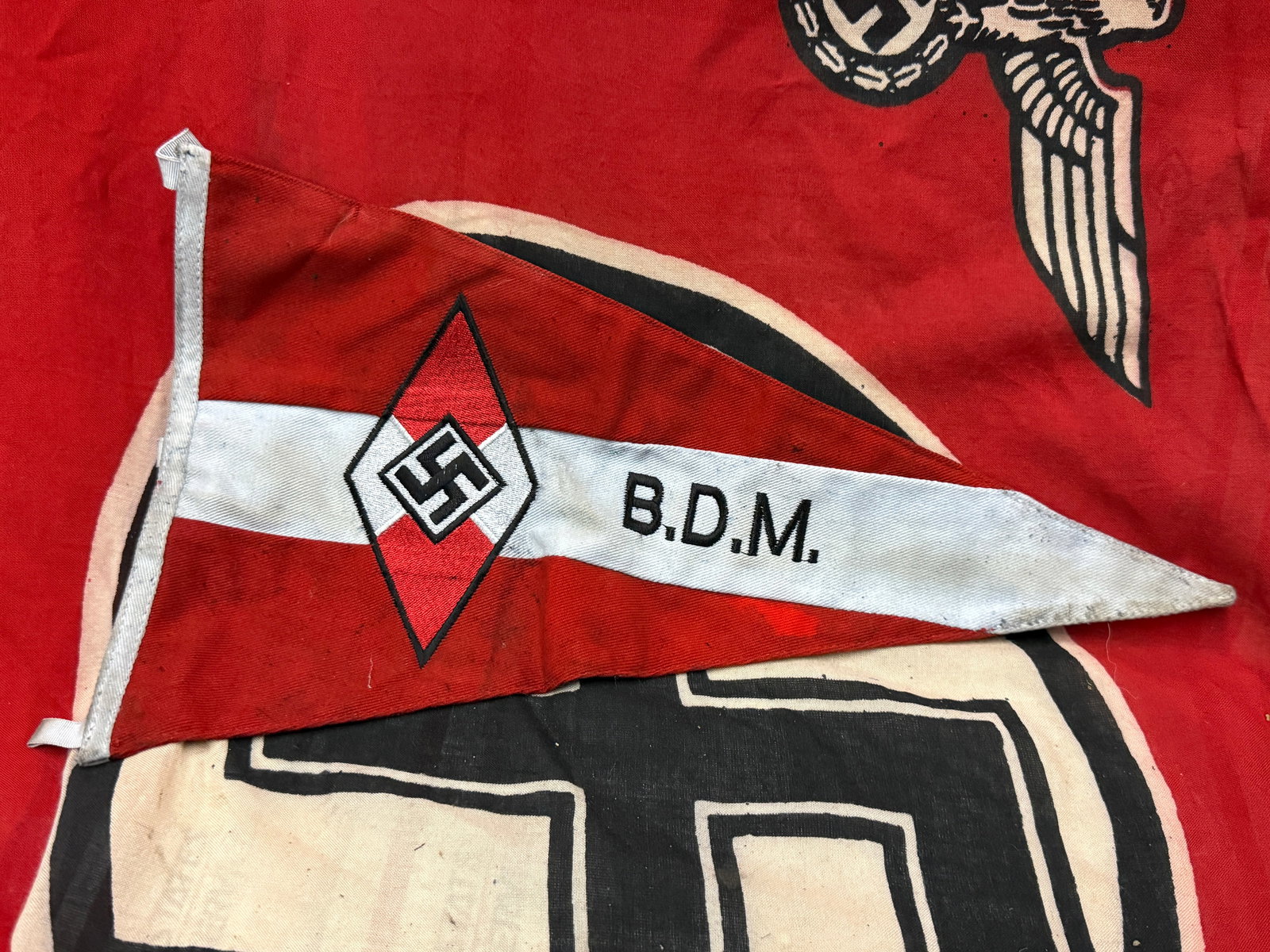 WW2 GERMAN HJ BUND DEUTSCHER MADEL (BDM) GAU AACHEN BAZIRK DUREN PENNANT: WW2 GERMAN HJ BUND DEUTSCHER MADEL (BDM) GAU AACHEN BAZIRK DUREN PENNANT. A VERY RARE FIND. SHOWS GOOD WEAR AND USE WITH A BEAUTIFUL OVERALL PATINA. WELL USED BUT PRESEVED AND CAREFULLY COLLECTED. PLE