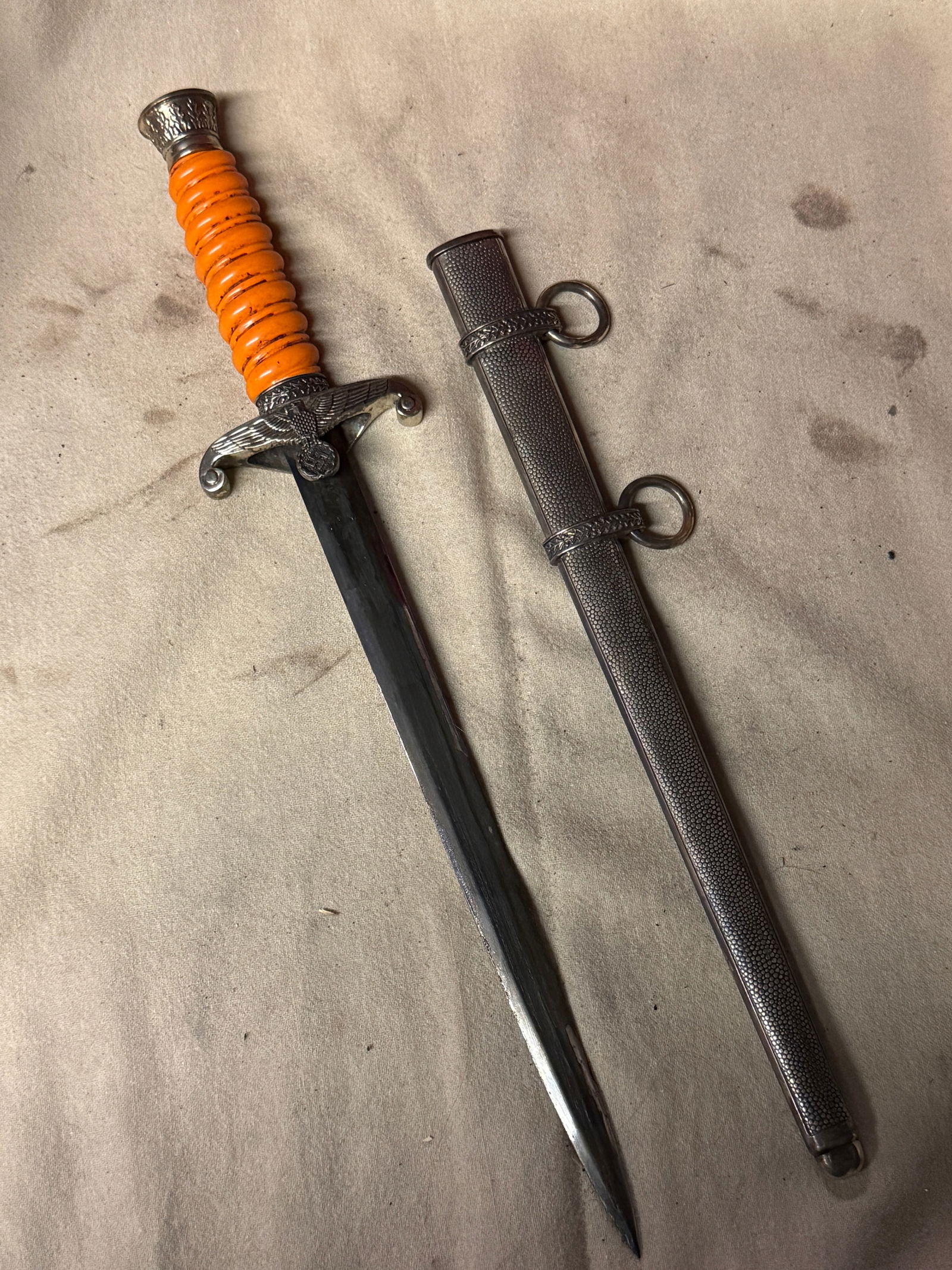 SCARCE WW2 GERMAN ARMY DAGGER WITH SCABBARD BY EICKHORN SOLINGEN: SCARCE WW2 GERMAN ARMY DAGGER WITH SCABBARD BY EICKHORN SOLINGEN. A VERY RARE FIND. SHOWS GOOD WEAR AND USE WITH A BEAUTIFUL OVERALL PATINAL MAKER MARKED. COMES WITH THE ORIGINAL SHEATH. APPEARS TO BE