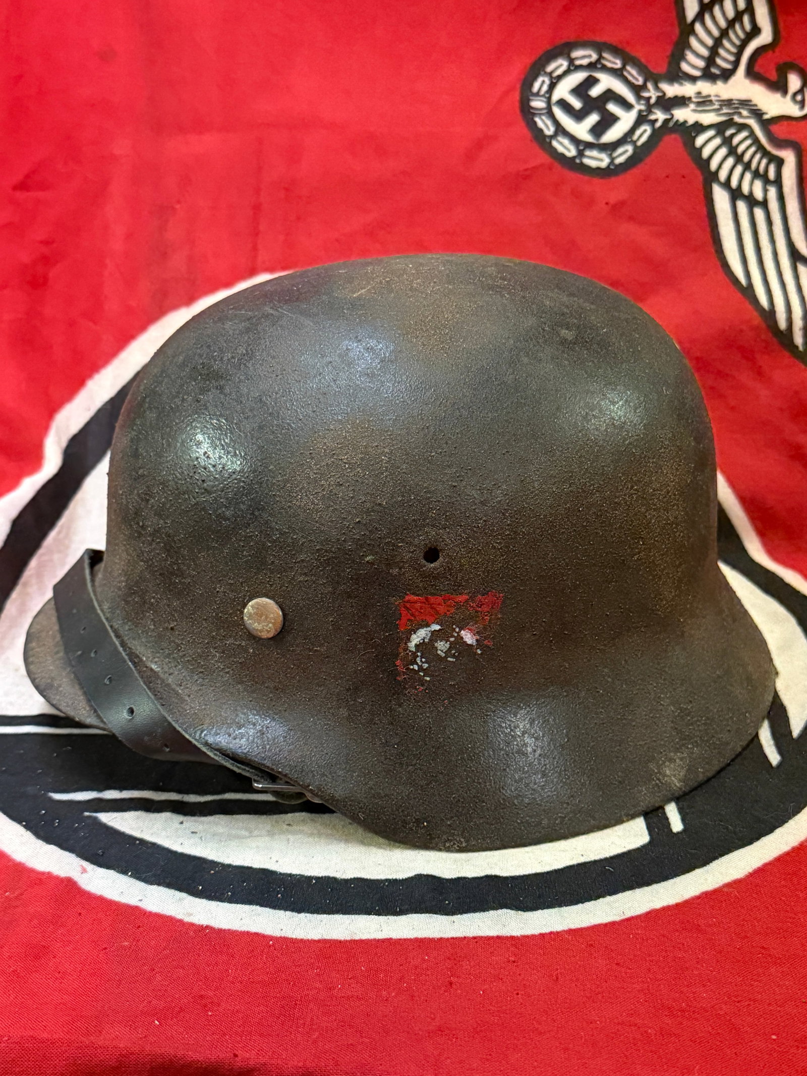 VERY RARE WW2 GERMAN TOTENKOPF SS DOUBLE DECAL HELMET BY R. LARSEN BERLIN 1940: VERY RARE WW2 GERMAN TOTENKOPF SS DOUBLE DECAL HELMET. THE LEATHER CHIN STRAP IS MAKER MARKED R. LARSEN BERLIN 1940. AN ULTRA RARE FIND THAT IS IN MINT OVERALL SHAPE AND CONDITION WITH A BEAUTIFUL OVE