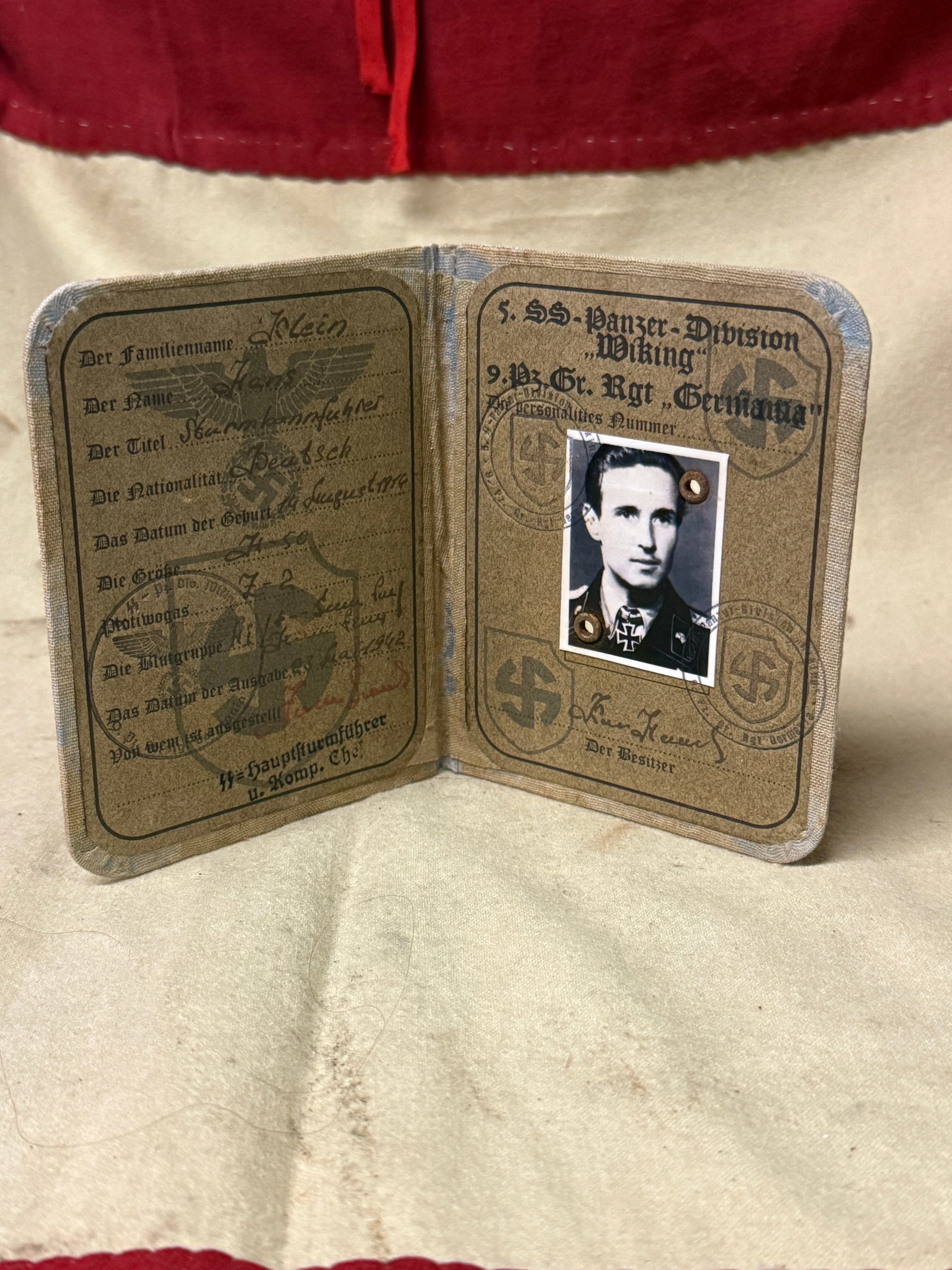 RARE WW2 GERMAN SS WIKING DIVISION PASSPORT WITH INSPECTION STAMP: RARE WW2 GERMAN SS WIKING DIVISION PASSPORT WITH INSPECTION STAMP. A VERY RARE FIND. SHOWS GOOD WEAR AND USE WITH A BEAUTIFUL OVERALL PATINA. PLEASE VEIW ALL DETAILED PICTURES. A VERY RARE FIND.
