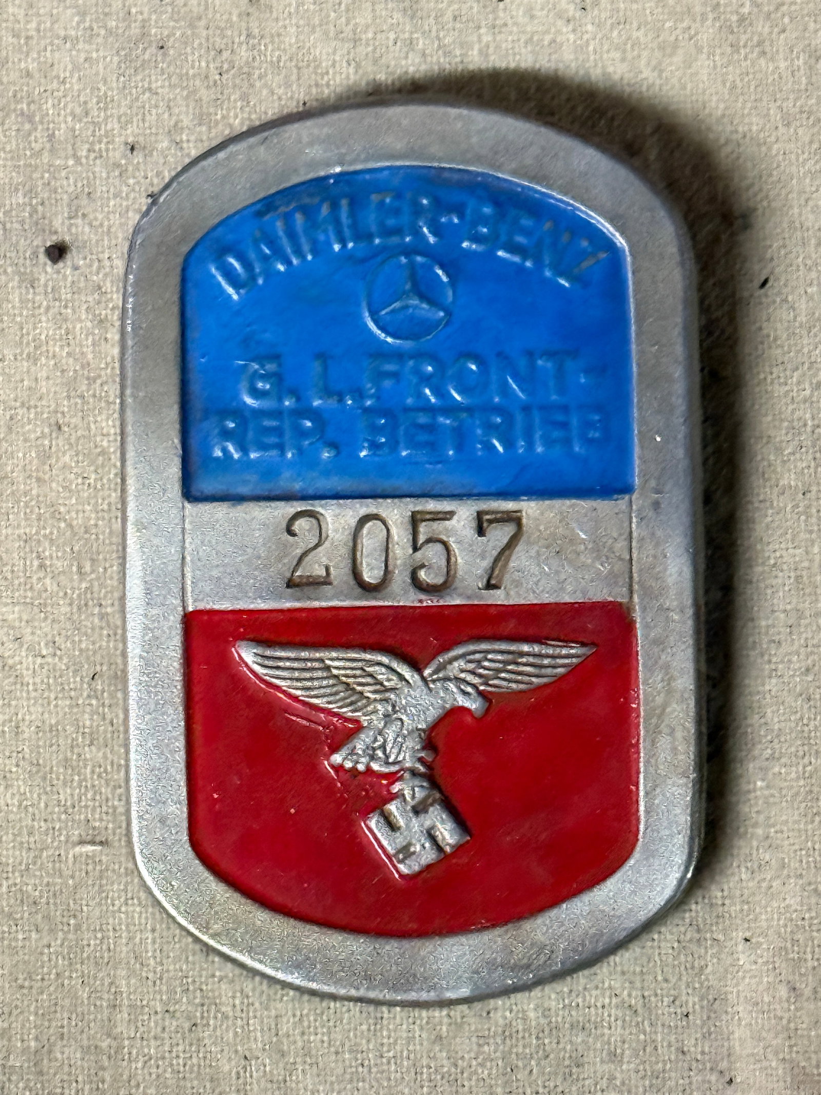 WW2 GERMAN FORCED LABOR MERCEDES BENZ LUFTWAFFE WORKERS ID PIN: WW2 GERMAN FORCED LABOR MERCEDES BENZ LUFTWAFFE WORKERS ID PIN. SHOWS GOOD WEAR AND USE WITH A BEAUTIFUL OVERALL PATINA. PLEASE VIEW ALL DETAILED PICTURES. A RARE EXAMPLE.