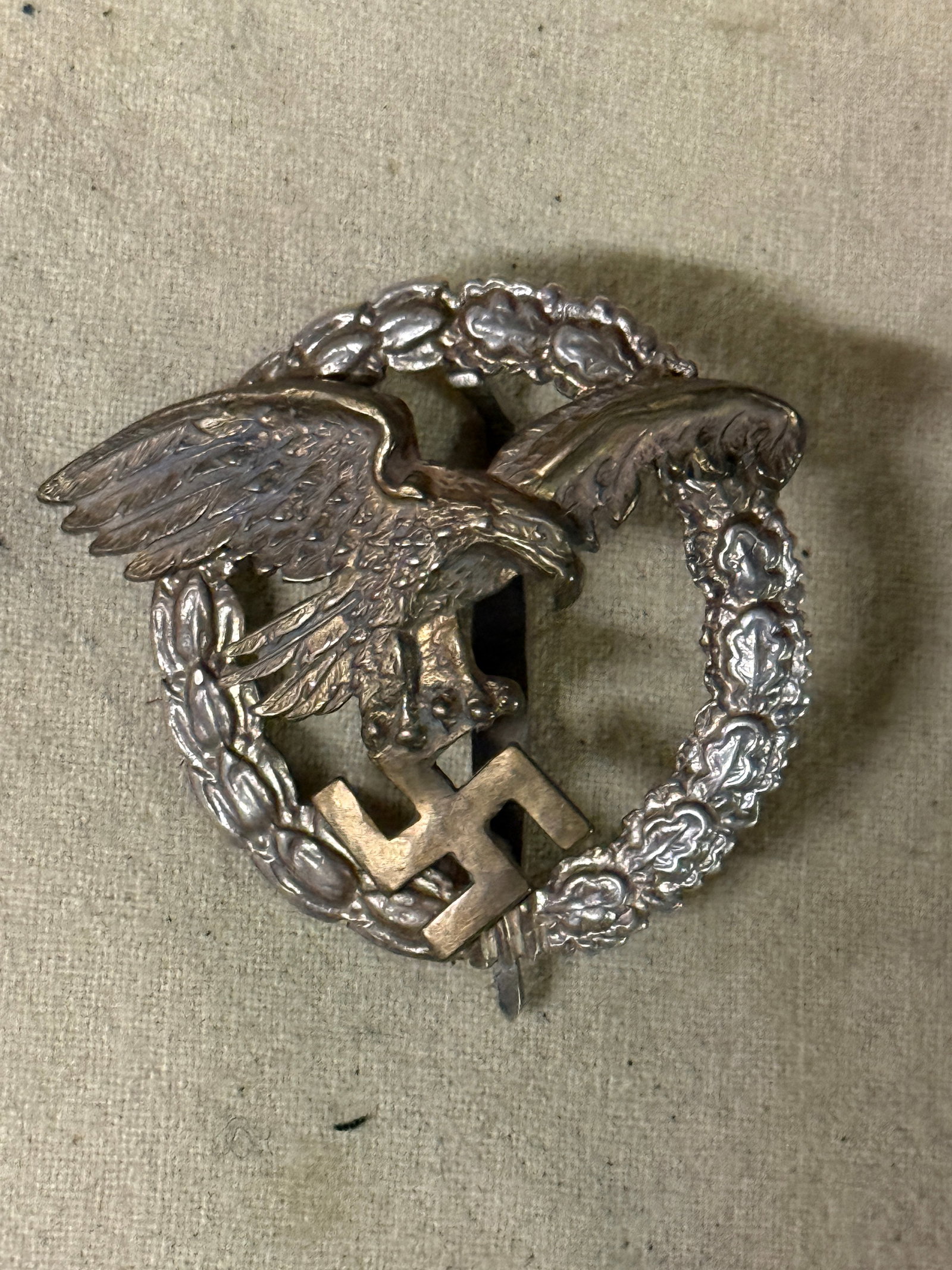 WW2 GERMAN LUFTWAFFE OBSERVER BADGE IN 900 SILVER BY RRS: WW2 GERMAN LUFTWAFFE OBSERVER BADGE IN 900 SILVER BY RRS. A VERY RARE FIND. SHOWS GOOD WEAR AND USE WITH A BEAUTIFUL OVERALL PATINA. PLEASE VIEW ALL DETAILED PICTURES. A VERY RARE FIND. MARKED 900 AS 