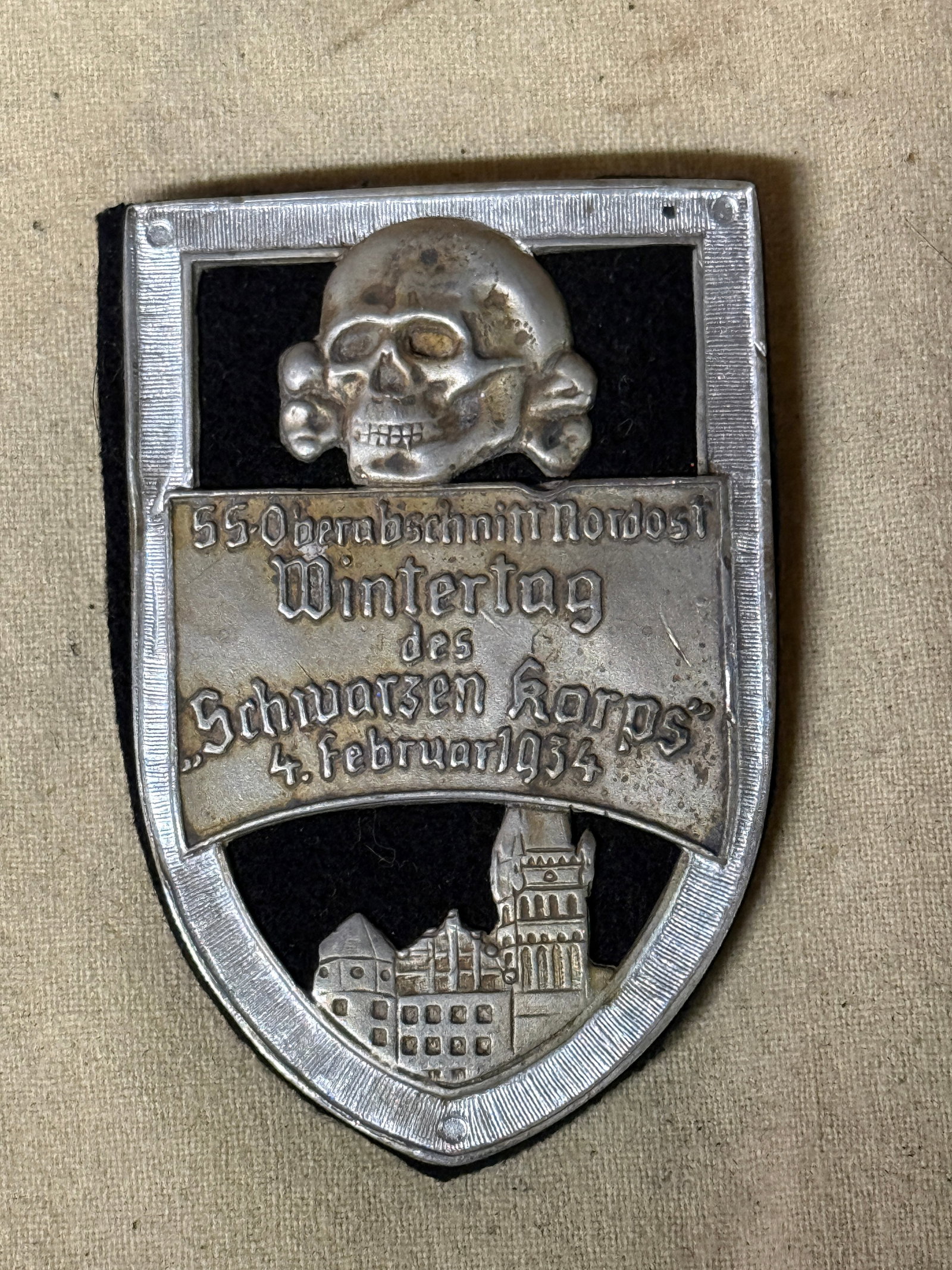 German WWII Waffen SS 1934 Wintertag Skull Badge By Ges. Gesch.: German WWII Waffen SS 1934 Wintertag Skull Badge By Ges. Gesch. A very rare find. Shows good wear and use with a beautiful overall patina. Please view all detailed pictures. A very rare example.