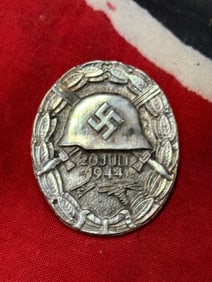 WW2 GERMAN WOUND BADGE DATED MARKED AND SIGNED HIMMLER AND HITLER