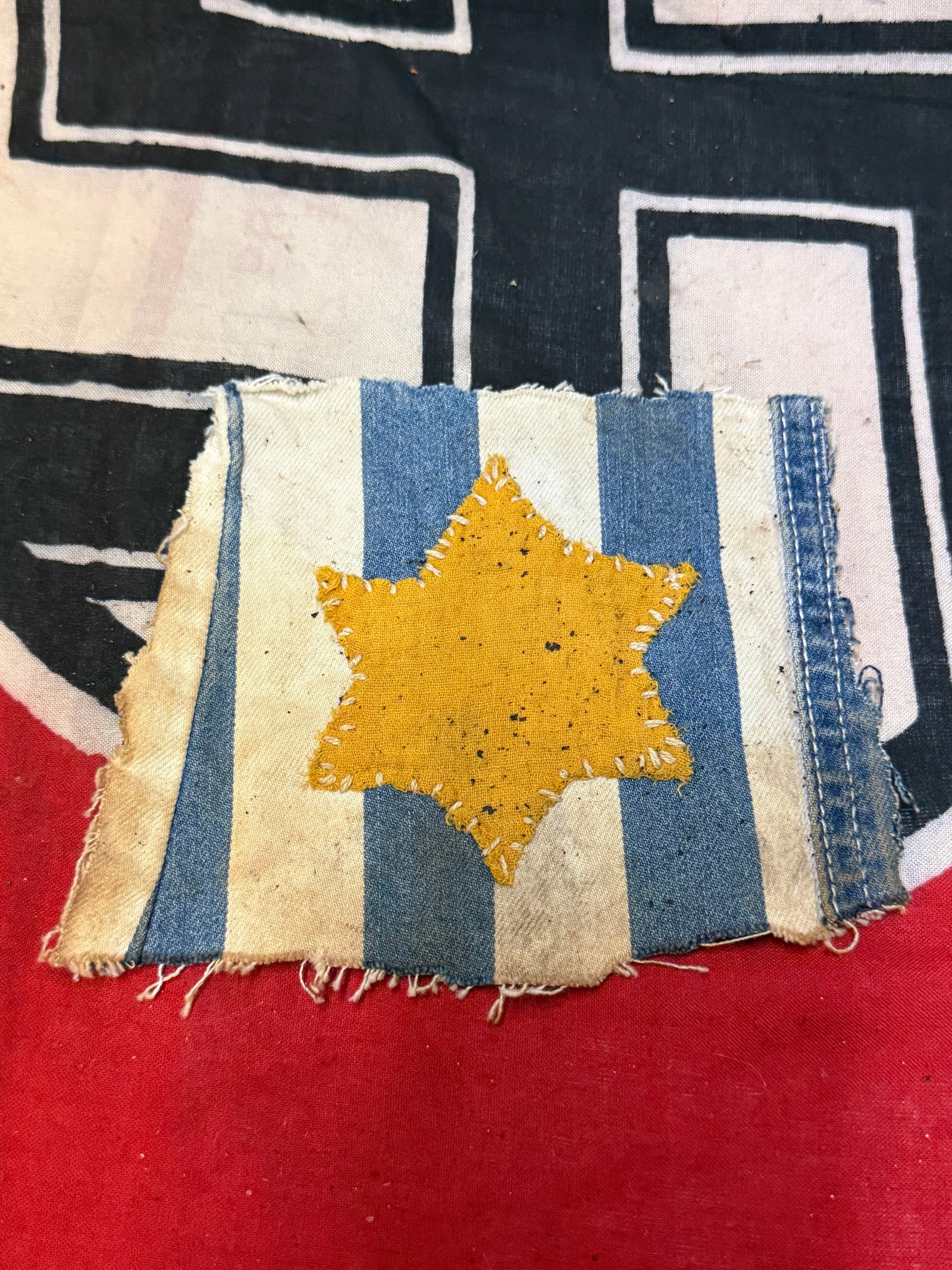 WW2 GERMAN CONCENTRATION CAMP STAR OF DAVID UNIFORM CUT OFF: WW2 GERMAN CONCENTRATION CAMP STAR OF DAVID UNIFORM CUT OFF. A RARE FIND. SHOWS GOOD WEAR AND USE WITH A BEAUTIFUL OVERALL PATINA. PLEASE VIEW ALL DETAILED PICTURES. A SCARCE EXAMPLE.
