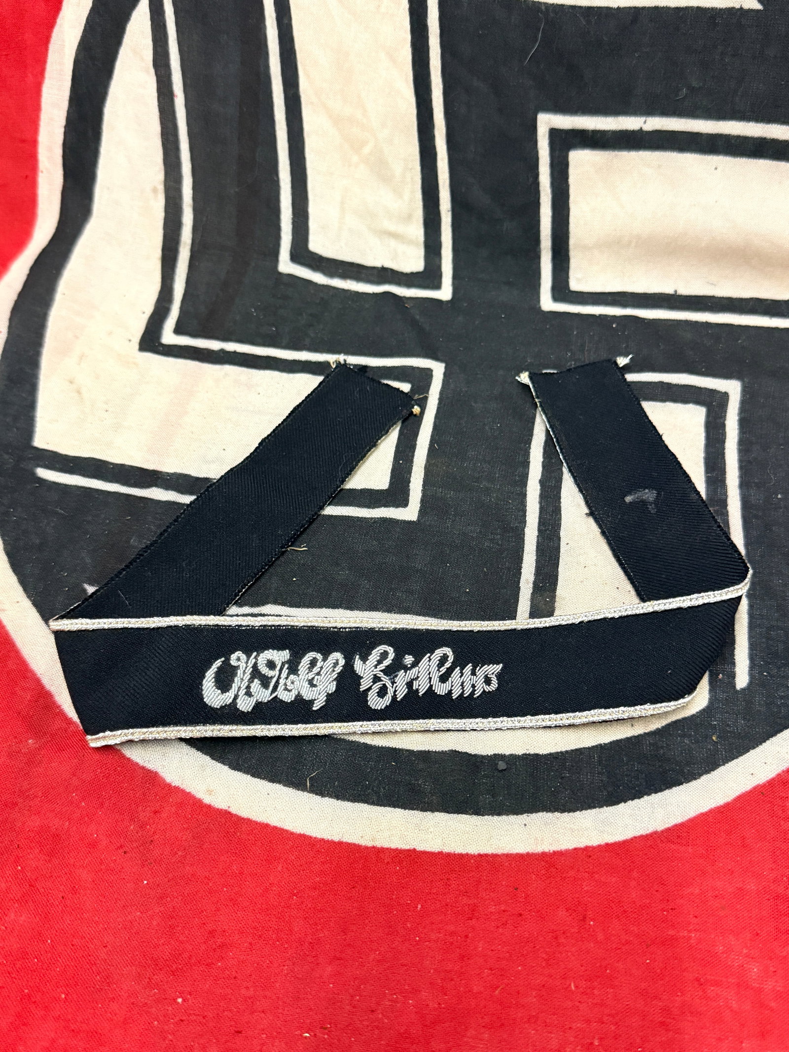 RARE WW2 GERMAN ADOLF HITLER CUFF TITLE: RARE WW2 GERMAN ADOLF HITLER CUFF TITLE. A VERY RARE FIND. SHOWS GOOD WEAR AND USE WITH A BEAUTIFUL OVERALL PATINA. PLEASE VIEW ALL DETAILED PICTURES. A VERY RARE EXAMPLE.