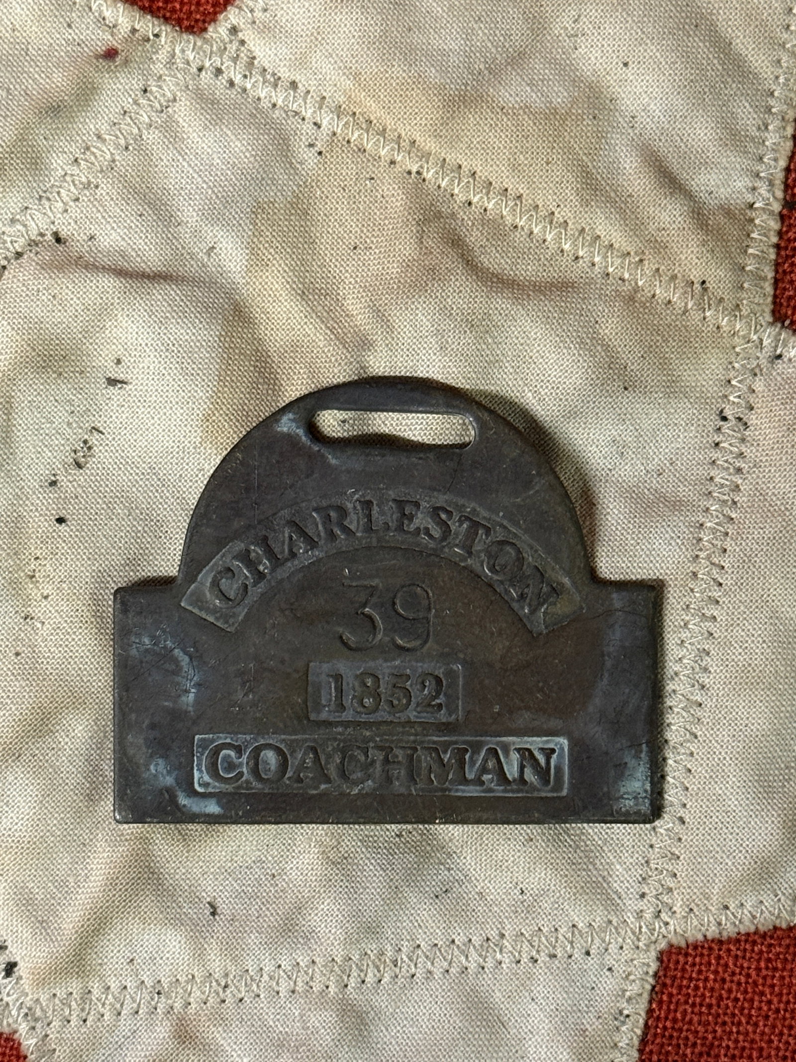 DATED 1852 #39 CHARLESTON COACHMAN SLAVE TAG SERVANT ID: DATED 1852 #39 CHARLESTON COACHMAN SLAVE TAG SERVANT ID. A RARE EXAMPLE THAT IS IN MINT OVERALL SHAPE AND CONDITION WITH A BEAUTIFUL OVERALL PATINA. SHOWS GOOD WEAR AND USE. PLEASE VIEW ALL DETAILED P