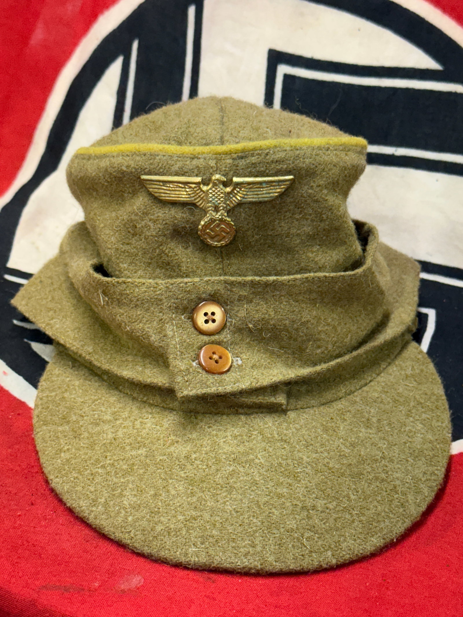 RARE WW2 GERMAN NSDAP POLITICAL LEADER CAP WITH MAKER STAMP: RARE WW2 GERMAN NSDAP POLITICAL LEADER CAP. A VERY RARE EXAMPLE OF THE TIME PERIOD. SHOWS GOOD WEAR AND USE WITH A BEAUTIFUL OVERALL PATINA. MAKER MARK STAMPED ON THE INSIDE OF THE CAP. A VERY RARE FI