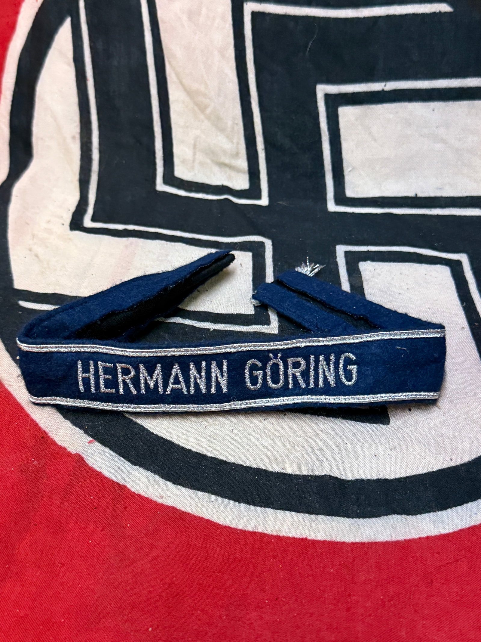RARE WW2 GERMAN HERMANN GORING CUFF TITLE: RARE WW2 GERMAN HERMANN GORING CUFF TITLE. AN ULTRA RARE FIND. SHOWS GOOD WEAR AND USE WITH A BEAUTIFUL OVERALL PATINA. APPEARS TO BE WELL USED IN ACTION. PLEASE VIEW ALL DETAILED PICTURES. A SCARCE F