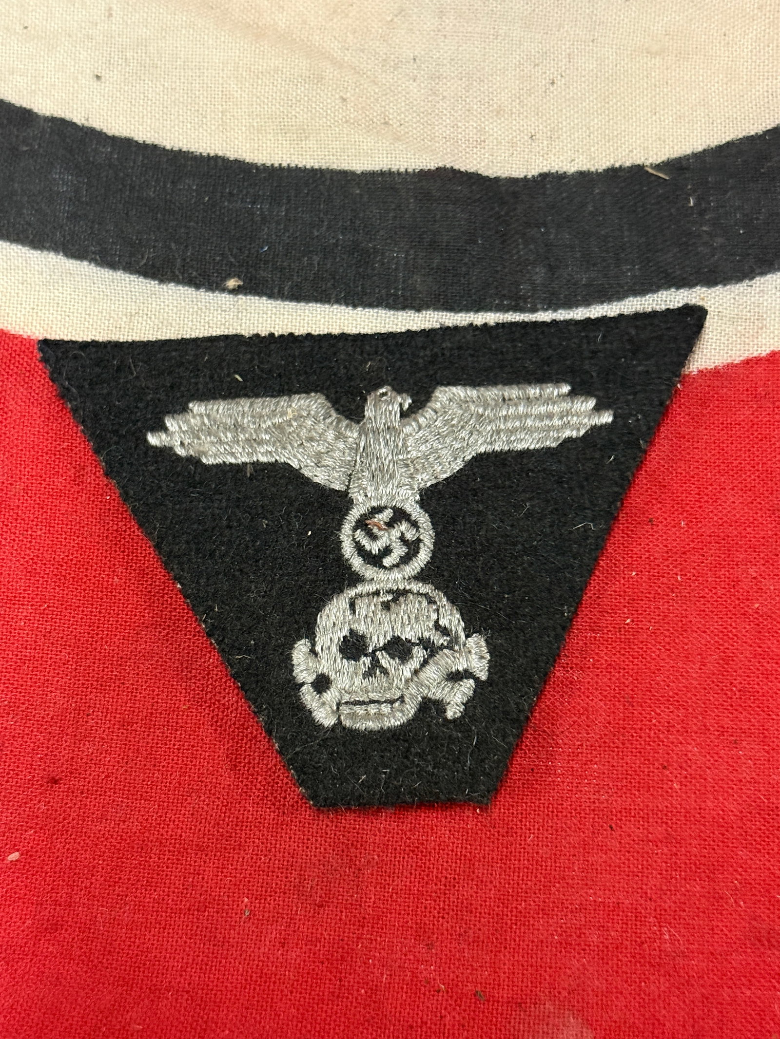 WW2 SS Panzer M43 Ski Cap Badge Insignia: WW2 SS Panzer M43 Ski Cap Badge Insignia. An ultra rare find. Shows good wear and use with a beautiful overall patina. Please view all detailed pictures. A very scarce example of the time period.