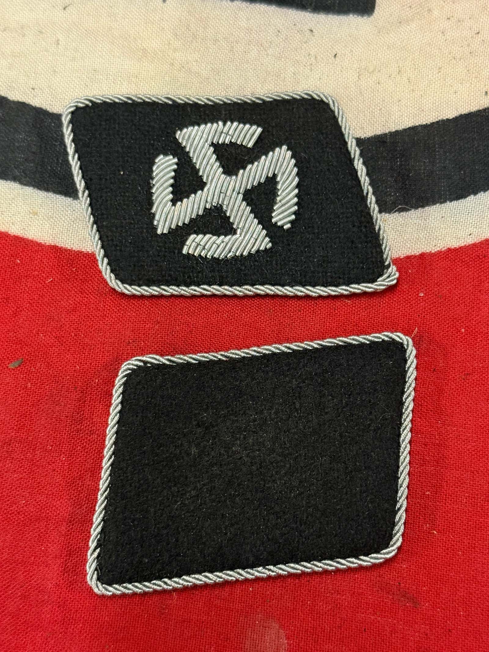 WW2 GERMAN WAFFEN SS VIKING DIVISION COLLAR TABS WITH RZM PAPER TAG: WW2 GERMAN WAFFEN SS VIKING DIVISION COLLAR TABS WITH RZM PAPER TAG. AN ULTRA RARE FIND THAT IS IN MINT OVERALL SHAPE AND CONDITION WITH A BEAUTIFUL OVERALL PATINA. SHOWS GOOD WEAR AND USE. PLEASE VIE