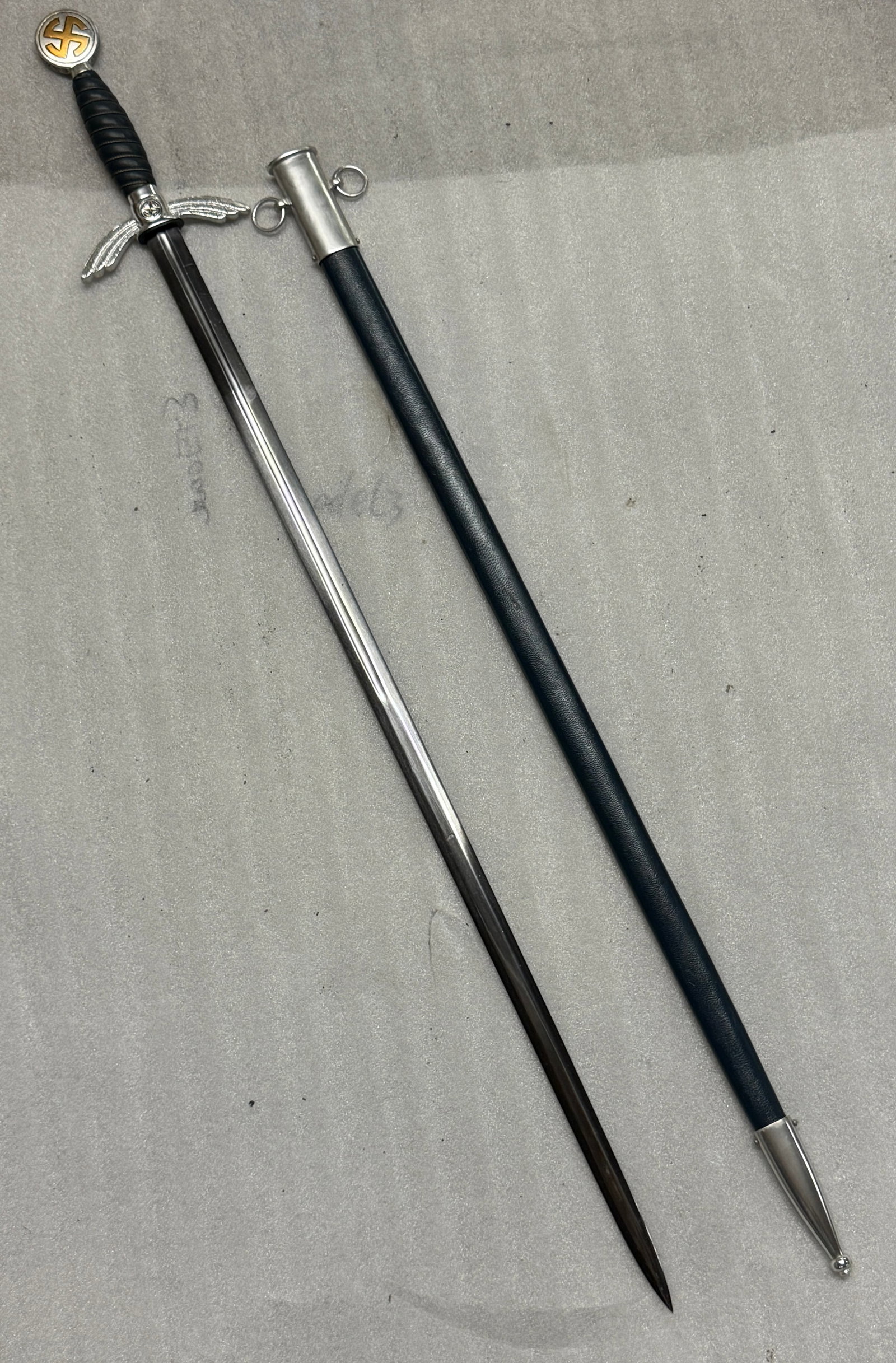 WW2 German Luftwaffe officer’s, 1st pattern sword with scabbard: WW2 German Luftwaffe officer’s, 1st pattern sword with scabbard. An ultra rare find that is in mint overall shape and condition with a beautiful overall patina. Comes with the original scabbard. Sho