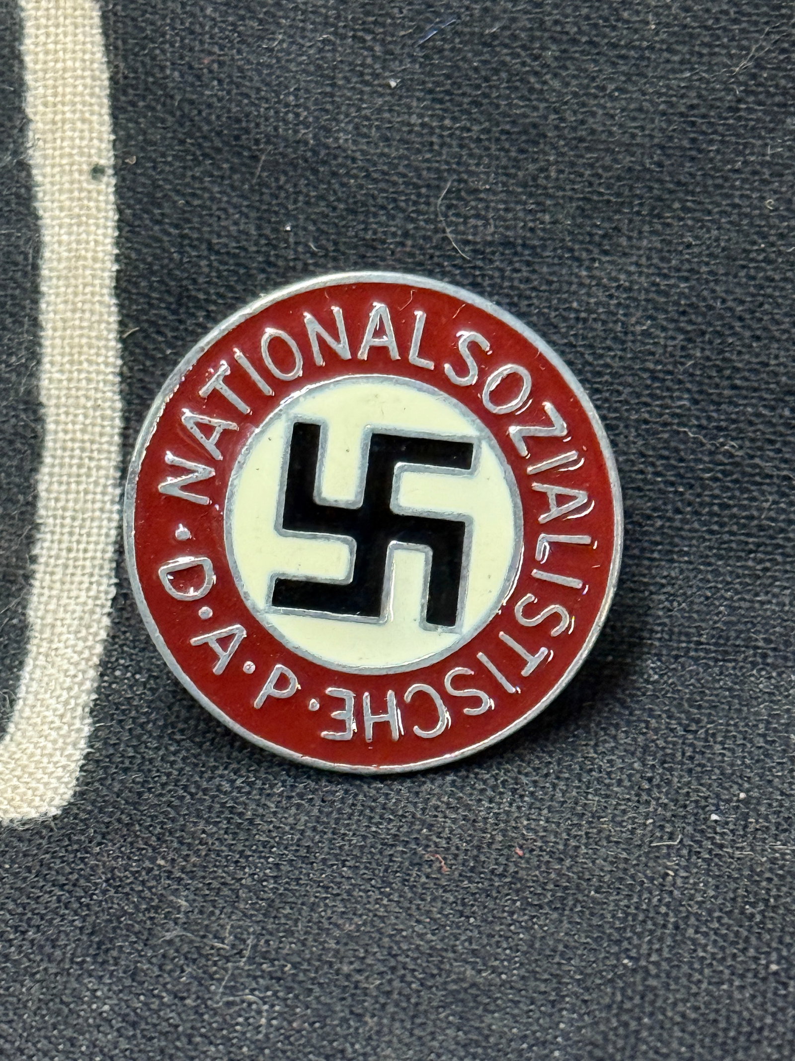WW2 GERMAN NSDAP ENAMELED LAPEL PIN - SCREW BACK CONSTRUCTION: WW2 GERMAN NSDAP ENAMELED LAPEL PIN - SCREW BACK CONSTRUCTION. A VERY RARE FIND. SHOWS GOOD WEAR AND USE WITH A BEAUTIFUL OVERALL PATINA. PLEASE VIEW ALL DETAILED PICTURES. A RARE EXAMPLE OF THE TIME 