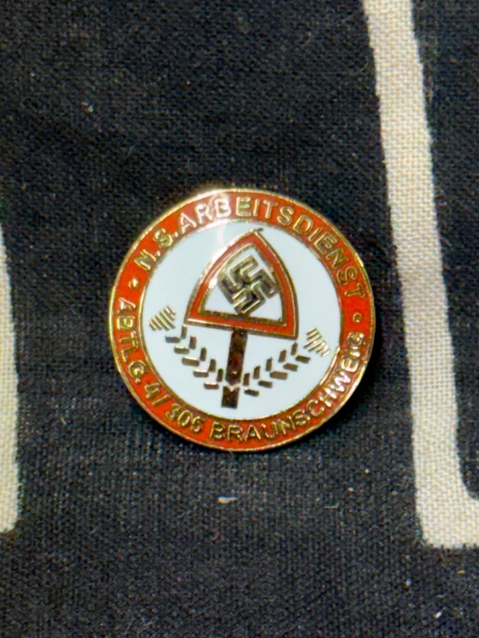 WWII German RAD lapel enameled badge By Ges. Gesch. 37: WWII German RAD lapel enameled badge By Ges. Gesch. 37. A very rare find. Shows good wear and use with a beautiful overall patina. Please view all detailed pictures. A very rare example of the time pe