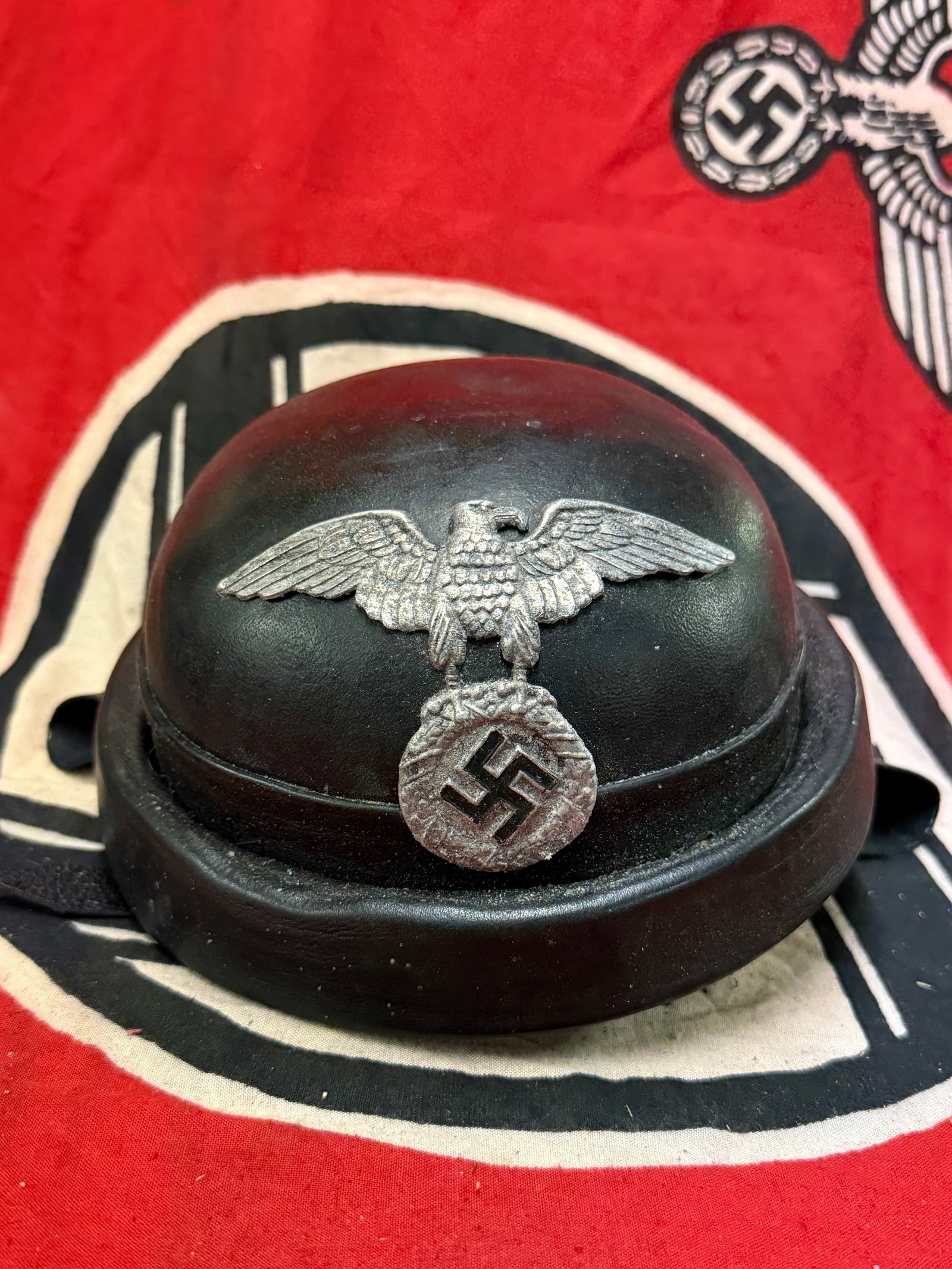 WW2 GERMAN NSKK MOTOR CORPS CRASH HELMET WITH RZM PAPER TAG AND STAMP: WW2 GERMAN NSKK MOTOR CORPS CRASH HELMET WITH RZM PAPER TAG AND STAMP. AN ULTRA RARE FIND. SHOWS GOOD WEAR AND USE WITH A BEAUTIFUL OVERALL PATINA. HAS THE RZM PAPER TAG ON THE INSIDE AND ALSO THE STA