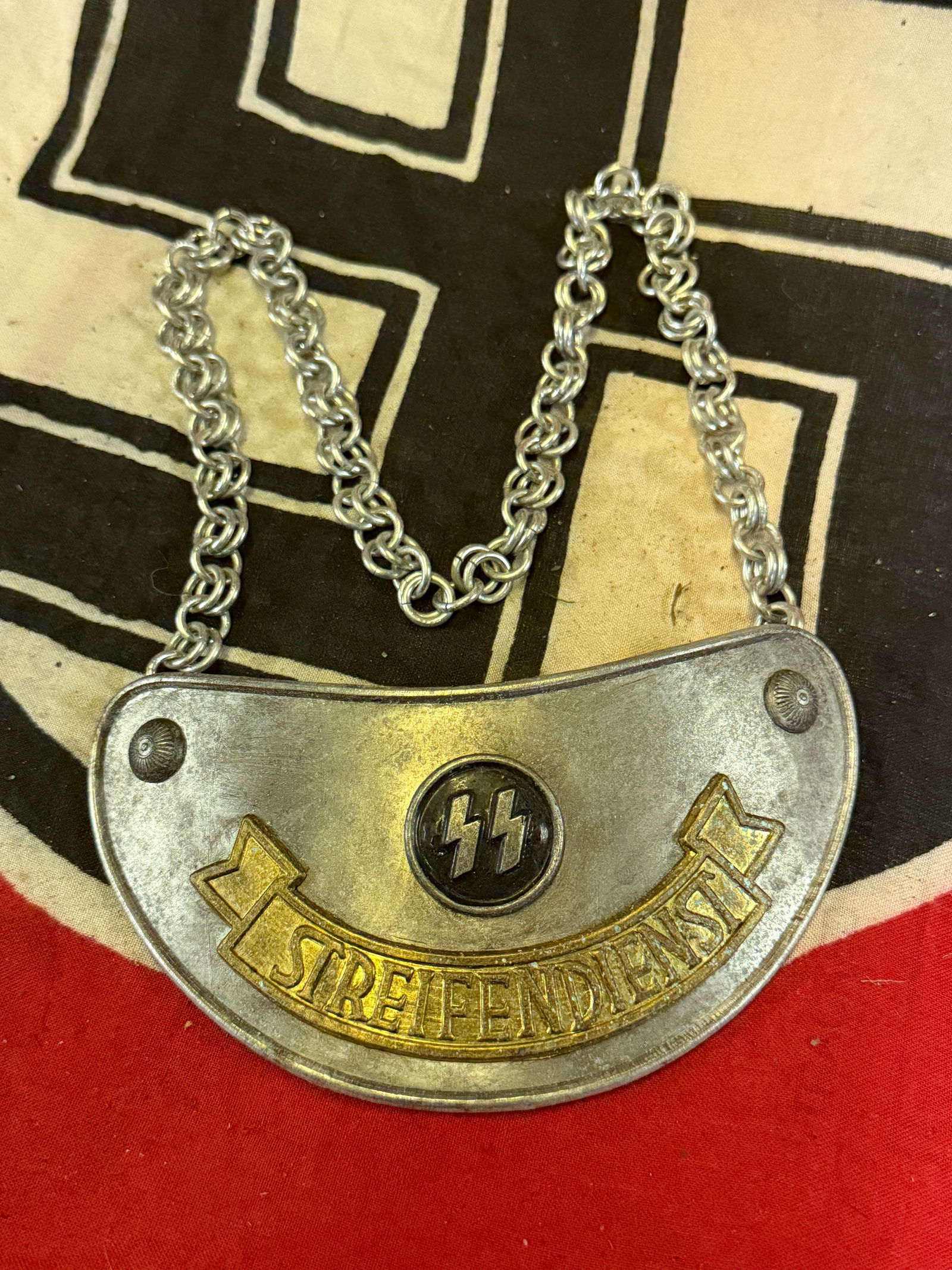 WWII GERMAN THIRD REICH SS STREIFENDIENST GORGET: WWII GERMAN THIRD REICH SS STREIFENDIENST GORGET. A VERY RARE EXAMPLE THAT IS IN MINT OVERALL SHAPE AND CONDITION WITH A BEAUTIFUL OVERALL PATINA. PLEASE VIEW ALL DETAILED PICTURES. A VERY RARE EXAMPL