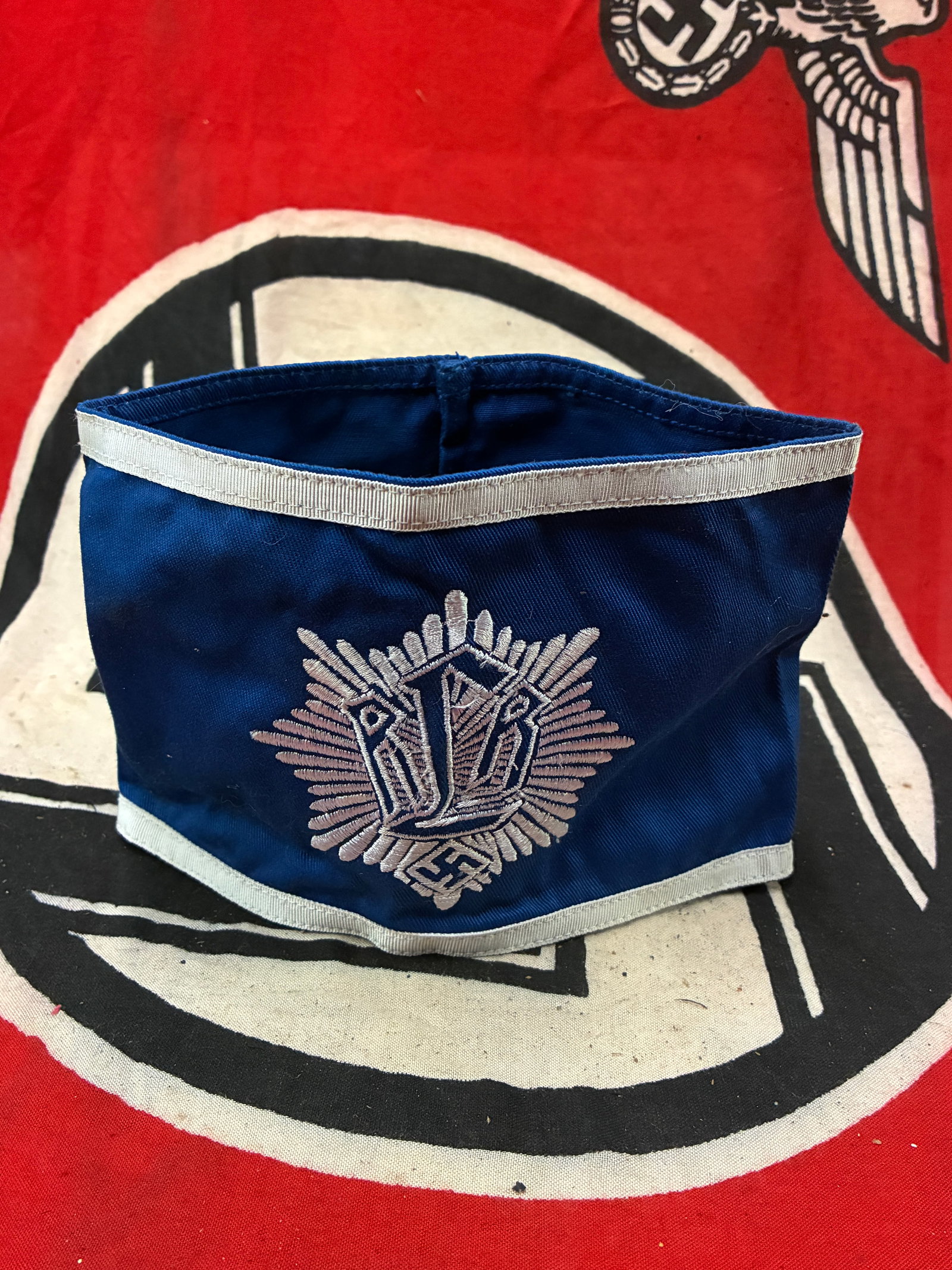 German WWII 1st Pattern RLB Embroidered Armband: German WWII 1st Pattern RLB Embroidered Armband. A very rare find. Shows good wear and use with a beautiful overall patina. Please view all detailed pictures. A very rare example of the time period.