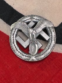 WWII GERMAN NSKK MOTORSPORTS BADGE IN 800 SILVER BY GES. GESCH.