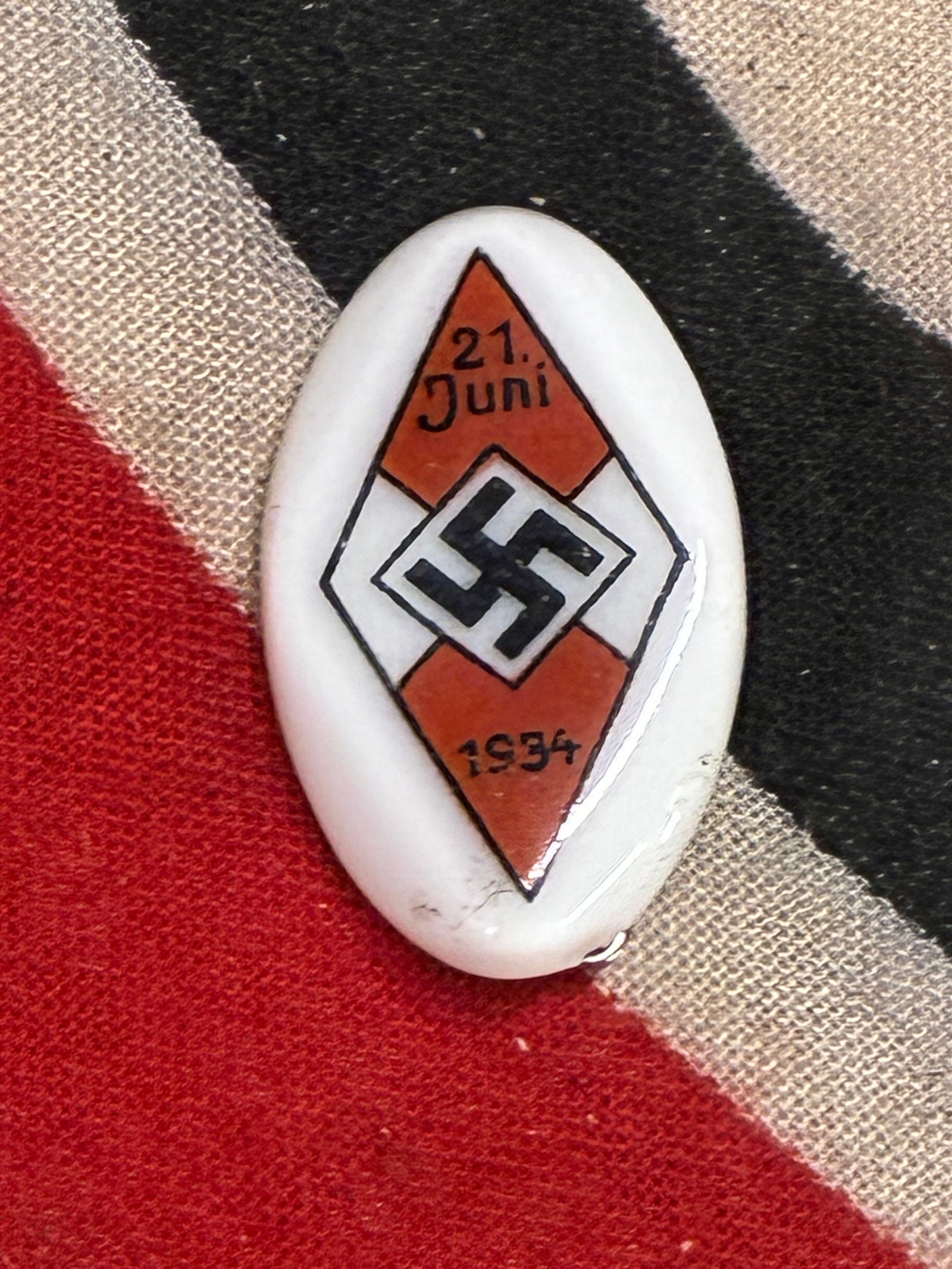 WWII 1934 Hitler Youth Festival Pin, Ceramic: WWII 1934 Hitler Youth Festival Pin, Ceramic. Vet bring back. Shows good wear and use with a beautiful overall patina. Please view all detailed pictures. A very rare example.