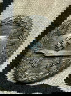 RARE WW2 GERMAN WOUND BADGE IN SILVER MARKED 65: RARE WW2 GERMAN WOUND BADGE IN SILVER MARKED 65. A VERY RARE EXAMPLE THAT IS IN MINT OVERALL SHAPE AND CONDITION WITH A BEAUTIFUL OVERALL PATINA. PLEASE VIEW ALL DETAILED PICTURES. A SCARCE FIND.