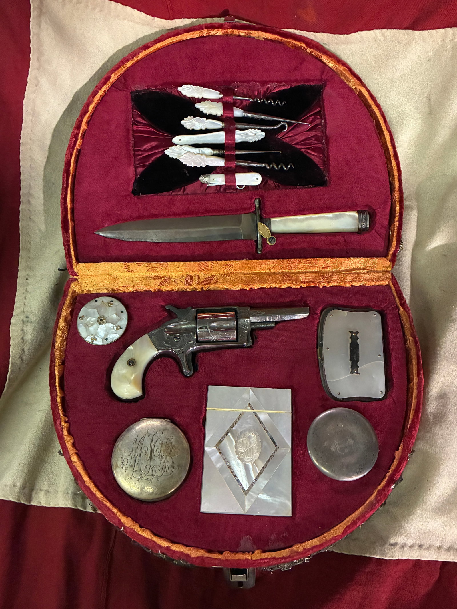 1873 ID'D HATTIE "LADY OF THE EVENING" COMPLETE CASED SET WITH GUN, DAGGER, ETC.: 1873 ID'D HATTIE "LADY OF THE EVENING" COMPLETE CASED SET WITH GUN, DAGGER, ETC. AN ULTRA RARE CASED SET THAT IS IN MINT OVERALL SHAPE AND CONDITION WITH A BEAUTIFUL OVERALL PATINA. BEAUTIFUL FEMININE