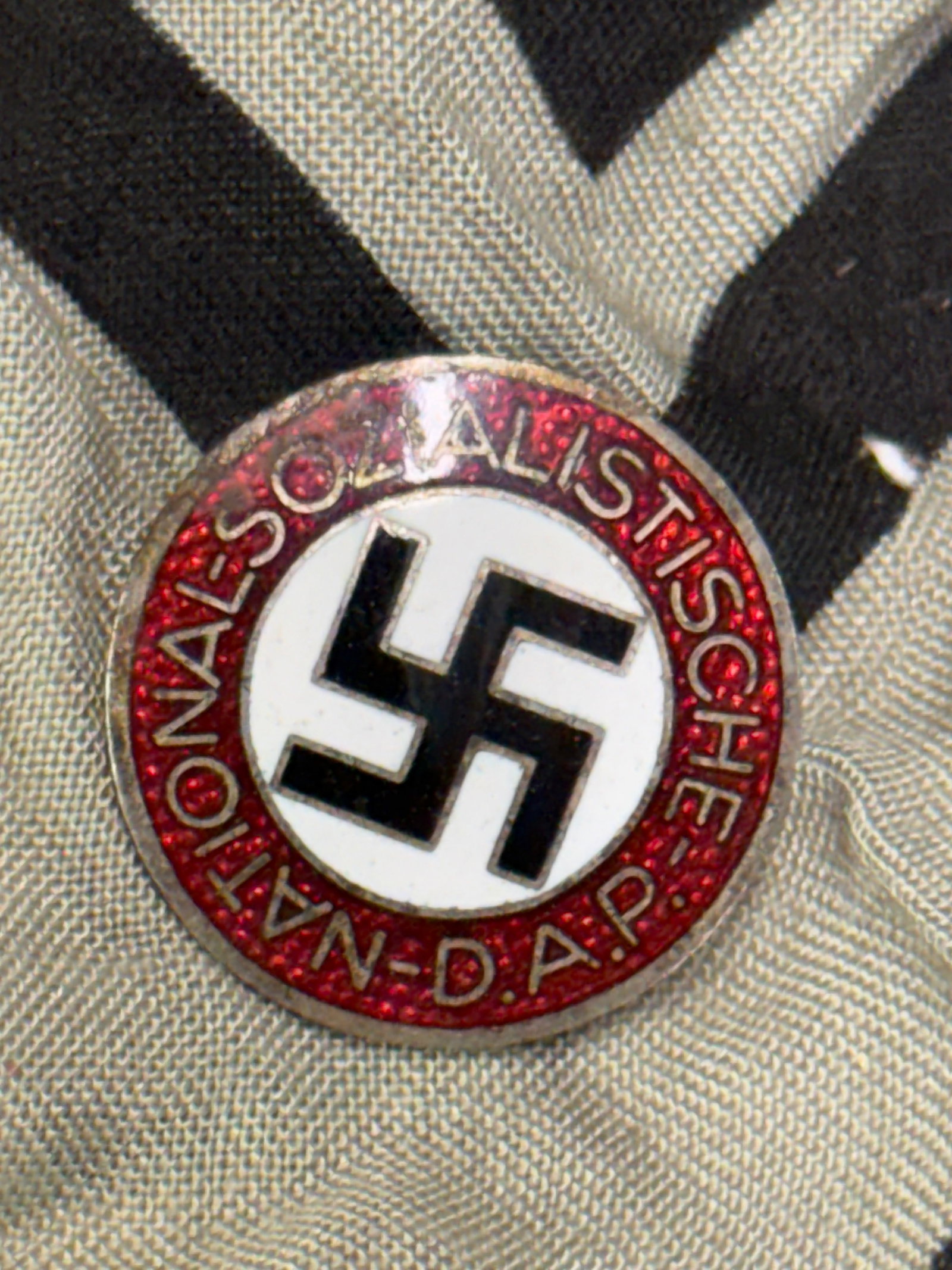 WW2 GERMAN NSDAP LAPEL ENAMELED PIN BADGE BY RZM M4/77: WW2 GERMAN NSDAP LAPEL ENAMELED PIN BADGE BY RZM M4/77. A VERY RARE FIND. SHOWS GOOD WEAR AND USE WITH A BEAUTIFUL OVERALL PATINA. PLEASE VIEW ALL DETAILED PICTURES. A SCARCE EXAMPLE OF THE TIME PERIO