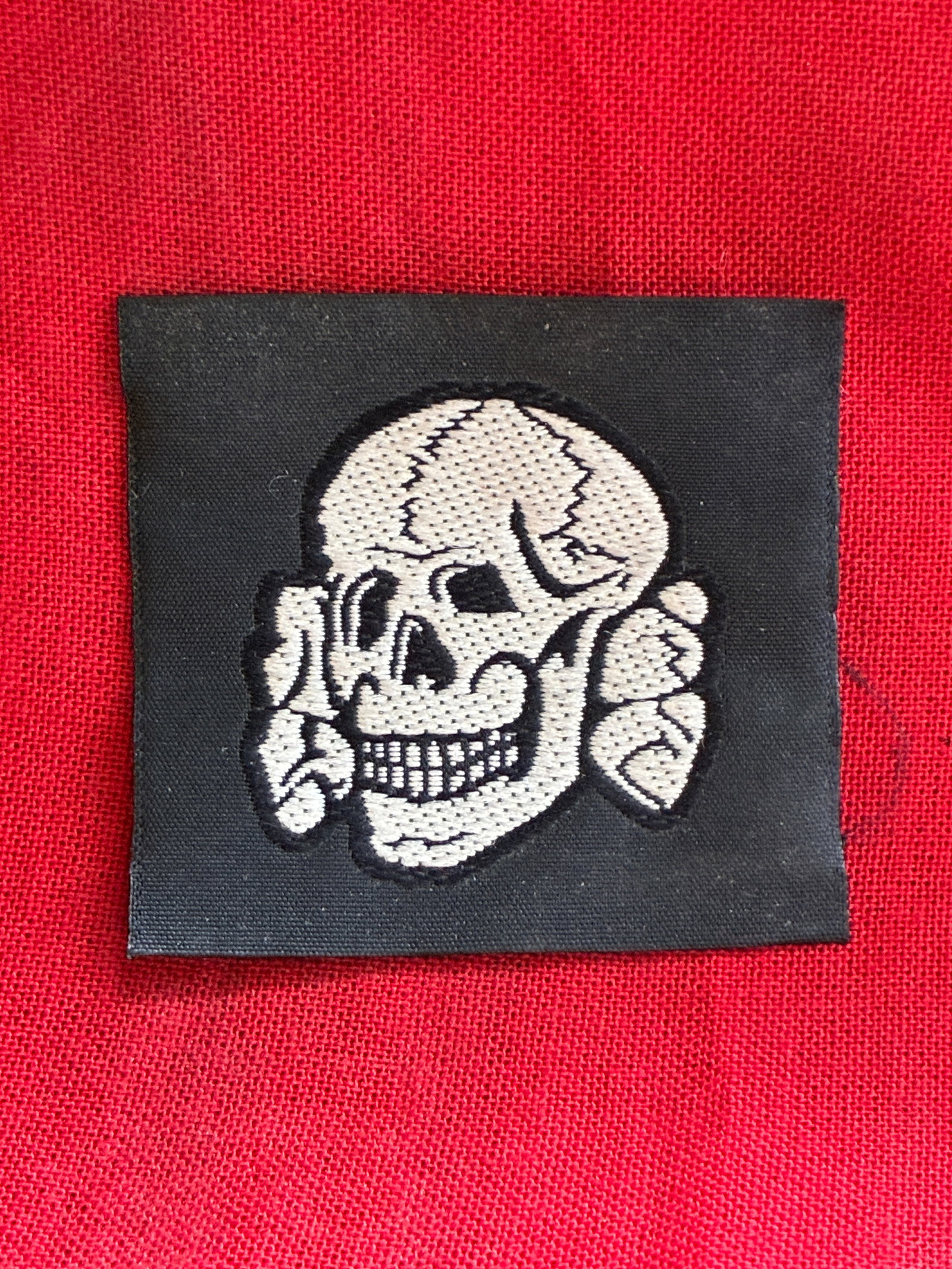WW2 German SS M43 EM/NCO Overseas Cap Bevo Skull: WW2 German SS M43 EM/NCO Overseas Cap Bevo Skull. On October 6TH 1934 in an attempt to distance themselves from the SA, the SS introduced a new metal cap skull to replace the previously used Prussian 