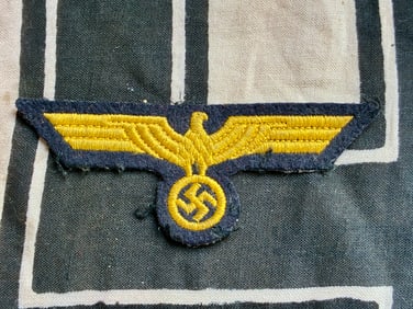 WW2 German Enlisted/NCO Eagle - May 1934 Yellow on dark blue backing