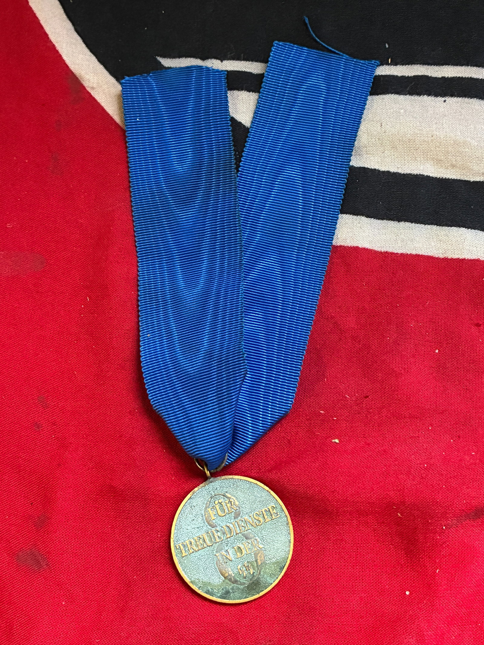 WW2 German SS 8 Year Long Service Medal With Ribbon: WW2 German SS 8 Year Long Service Medal With Ribbon. A rare find. Shows good wear and use with a beautiful overall patina. Please view all detailed pictures. A rare example of the time period.
