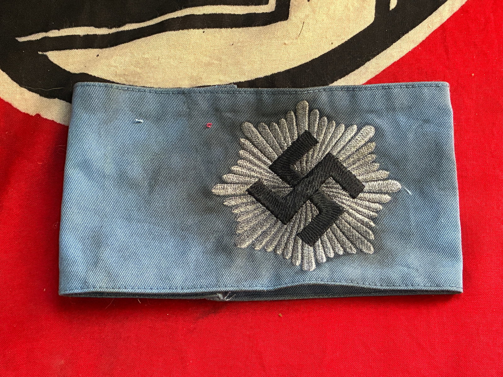 SCARCE WW2 GERMAN RLB ARMBAND WITH RZM PAPER TAG: SCARCE WW2 GERMAN RLB ARMBAND WITH RZM PAPER TAG. SHOWS GOOD WEAR AND USE WITH A BEAUTIFUL OVERALL PATINA. PLEASE VIEW ALL DETAILED PICTURES. A RARE EXAMPLE OF THE TIME PERIOD.