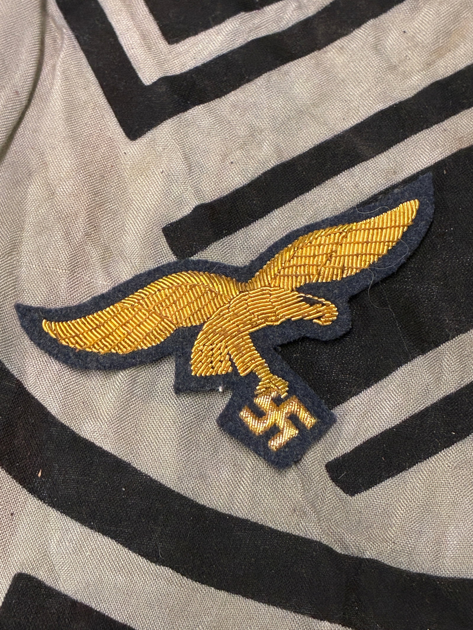WW2 GERMAN LUFTWAFFE GENERAL'S BREAST EAGLE 2ND TYPE: WW2 GERMAN LUFTWAFFE GENERAL'S BREAST EAGLE 2ND TYPE. In gilded flat and round wire, on thick grey Luftwaffe cloth backing, 90mm wing tip to wing tip, excellent quality, in very fine condition.