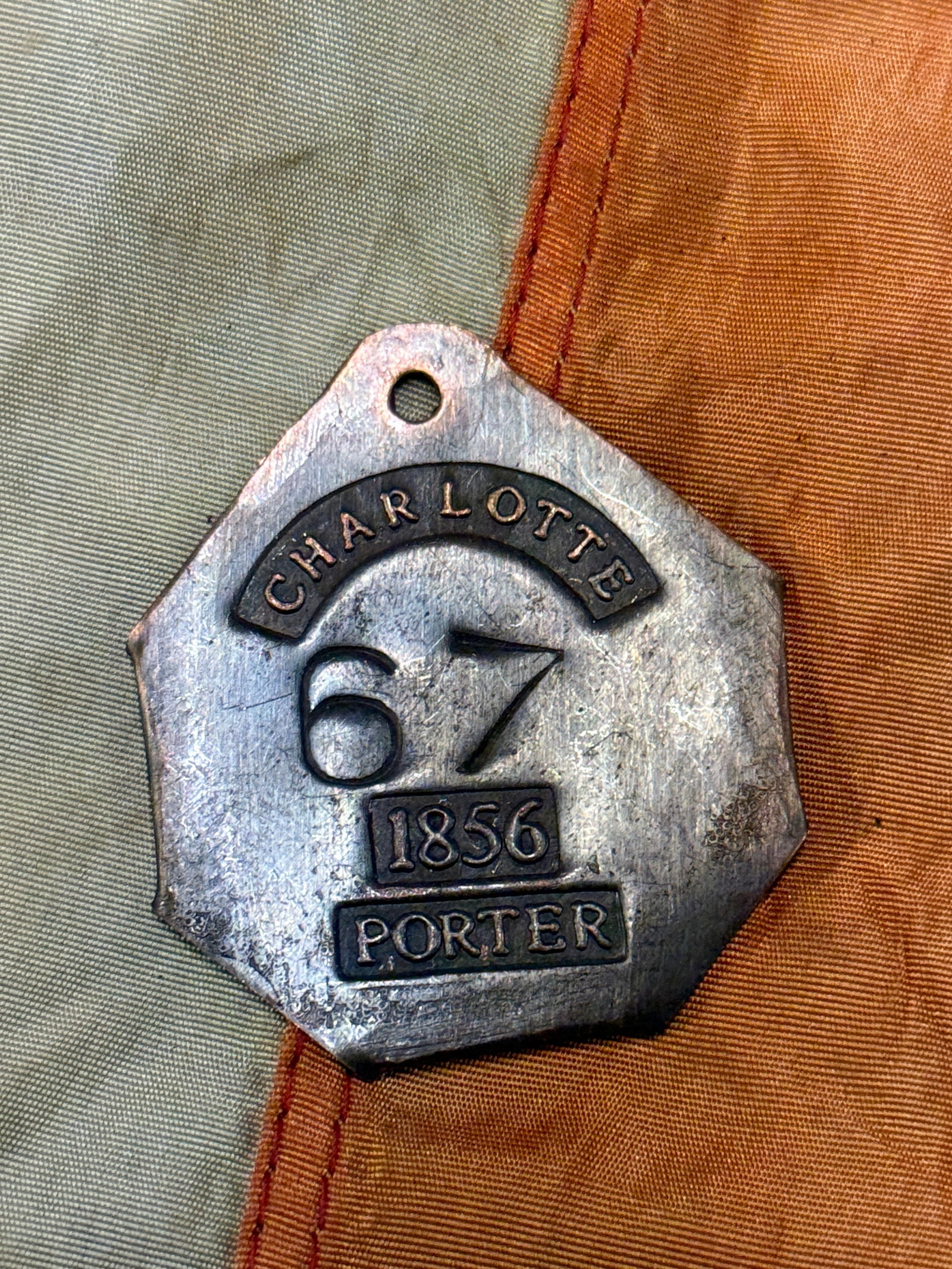 DATED 1856 #67 CHARLOTTE PORTER SLAVE TAG SERVANT ID: DATED 1856 #67 CHARLOTTE PORTER SLAVE TAG SERVANT ID. A RARE EXAMPLE THAT IS IN MINT OVERALL SHAPE AND CONDITION WITH A BEAUTIFUL OVERALL PATINA. HAS A GREAT LOOK TO IT WITH A N EXCELLENT OVERALL EYE 