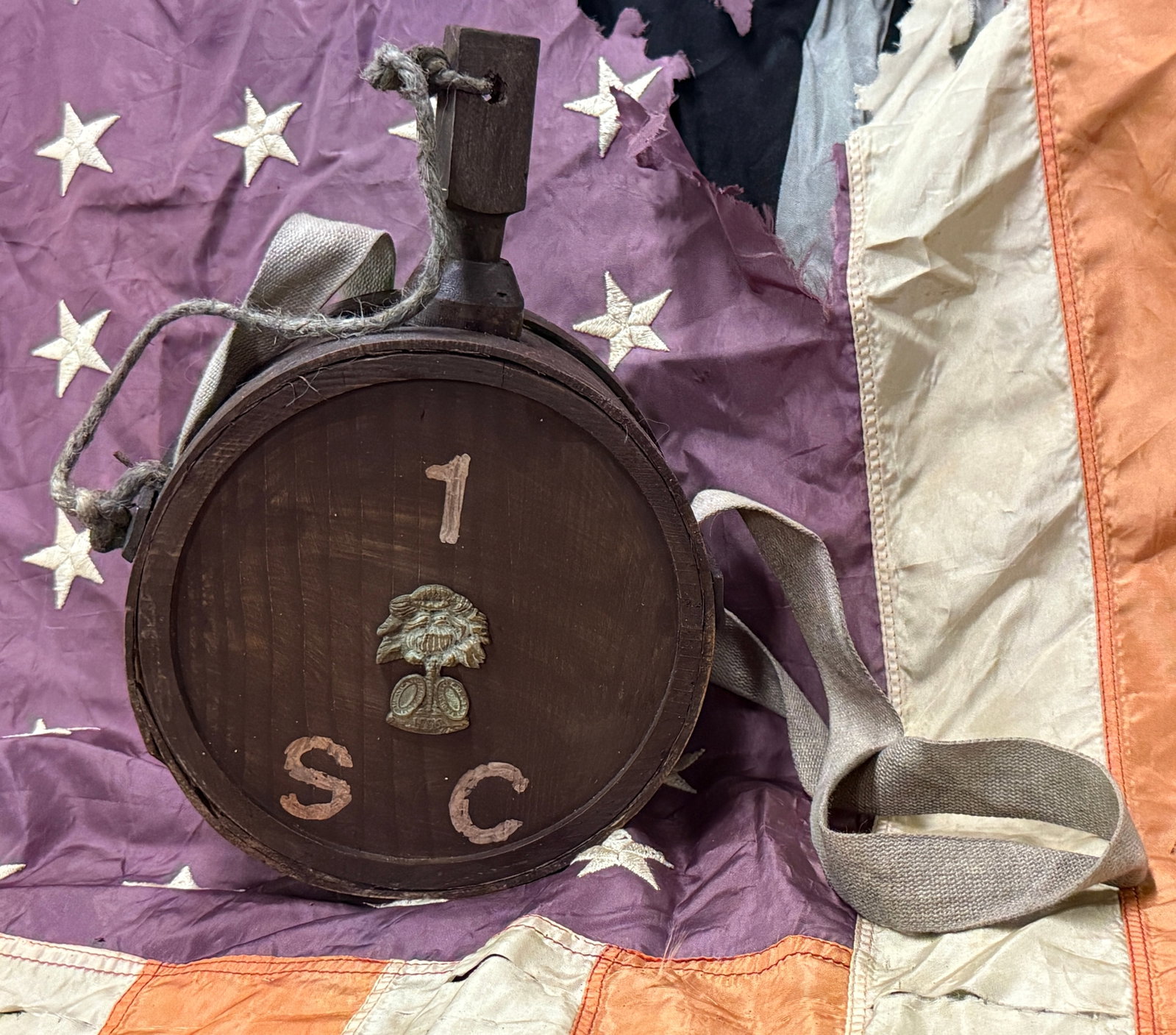 SCARCE CIVIL WAR CONFEDERATE CSA SOUTH CAROLINA WOODEN CANTEEN WITH SLING: SCARCE CIVIL WAR CONFEDERATE CSA SOUTH CAROLINA WOODEN CANTEEN WITH SLING. A RARE EXAMPLE THAT IS IN MINT OVERALL SHAPE AND CONDITION WITH A BEAUTIFUL OVERALL PATINA. HAS A GREAT LOOK TO IT WITH A N E