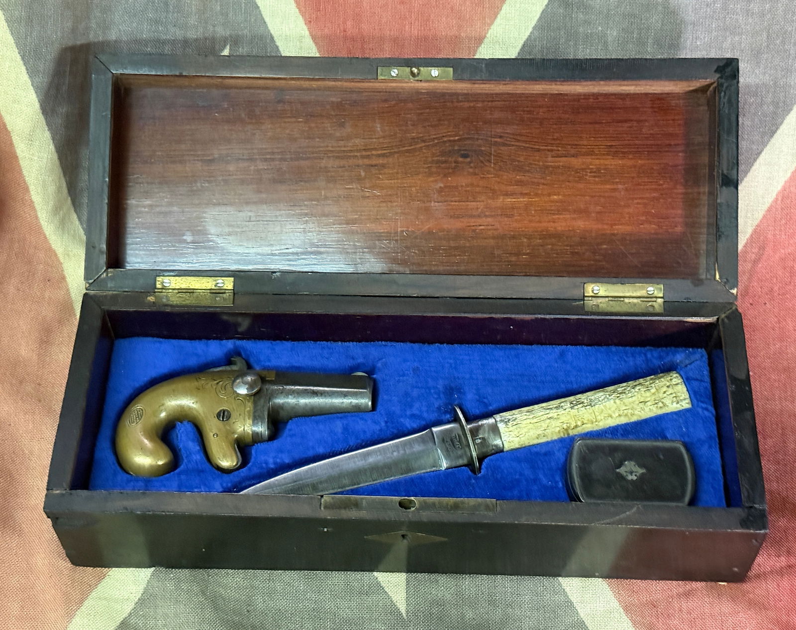 CASED CIVIL WAR NATIONAL ARMS CO. .38 CAL DERRINGER WITH WILL & FINCK DAGGER & BOX: THIS IS AN ULTRA RARE CASED CIVIL WAR NATIONAL ARMS CO. .38 CAL DERRINGER WITH WILL & FINCK DAGGER & ORNATE BOX WHICH ARE CASED IN A BEAUTIFUL WOODEN BOX. THIS IS AN ULTRA RARE FIND. National Arms Co.