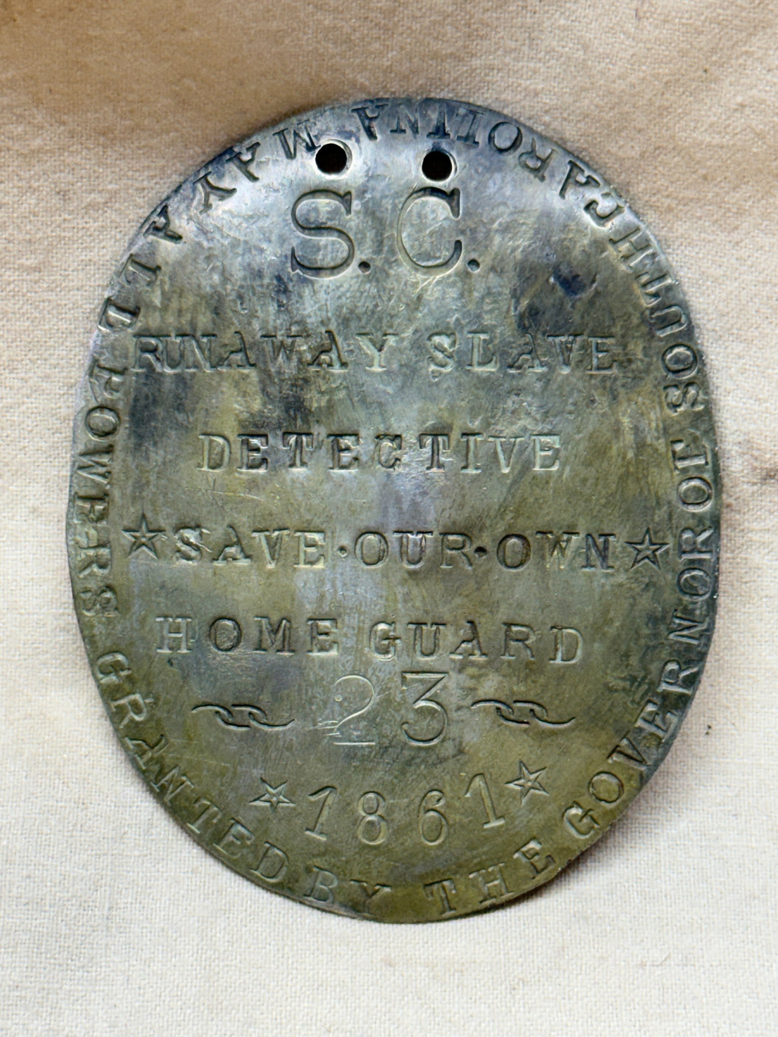 CIVIL WAR 1861 SOUTH CAROLINA RUNAWAY SLAVE DETECTIVE BADGE #23: CIVIL WAR 1861 SOUTH CAROLINA RUNAWAY SLAVE DETECTIVE BADGE #23. AN ULTRA RARE FIND. THIS IS A VERY RARE SLAVE DETECTIVE BADGE THAT IS IN MINT OVERALL SHAPE AND CONDITION WITH A BEAUTIFUL OVERALL PATI
