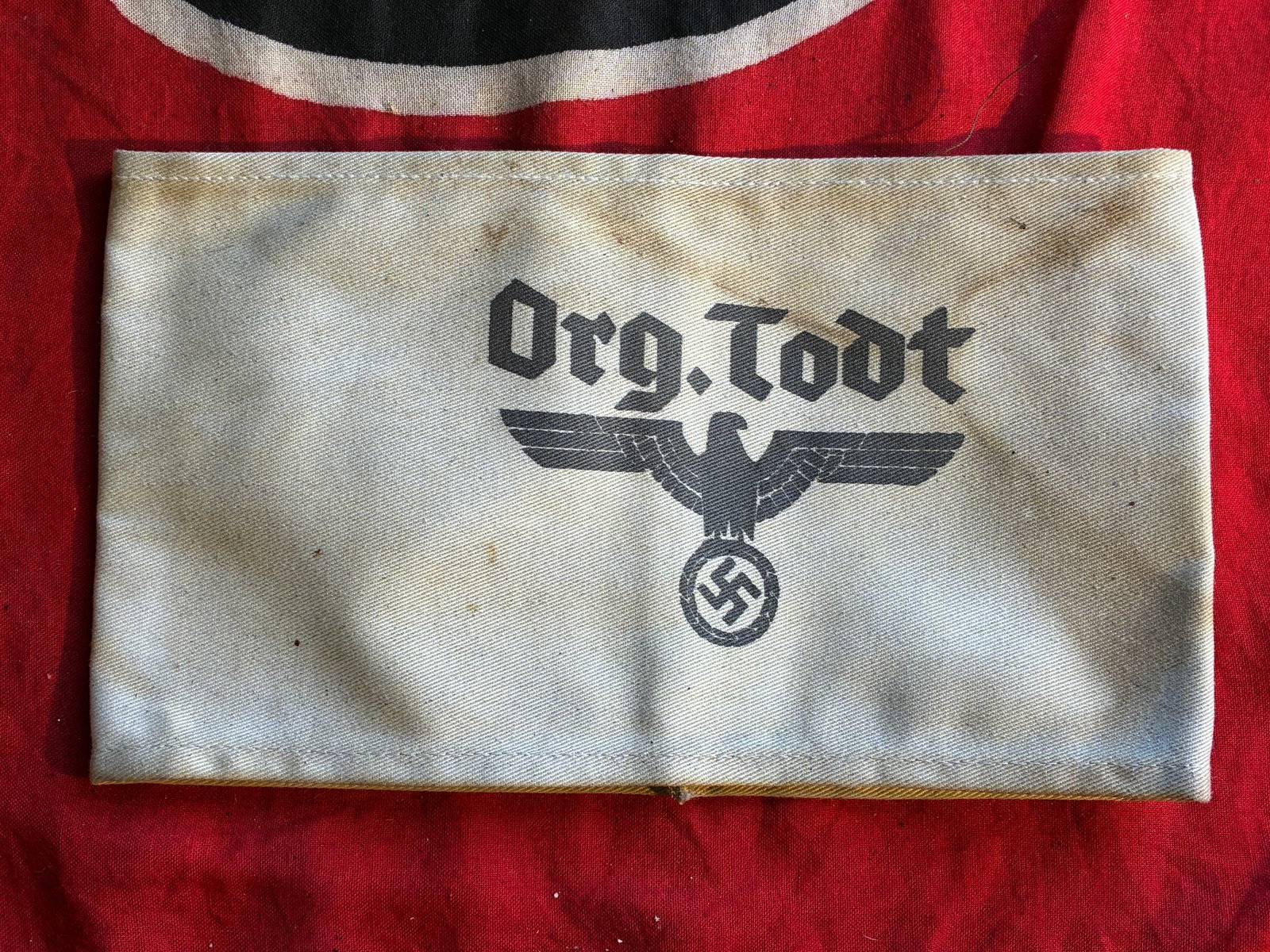 A rare WW2 German Third Reich Organisation Todt armband With RZM Paper Tag: A rare WW2 German Third Reich Organisation Todt armband With RZM Paper Tag. A rare example that is in mint overall shape and condition with a beautiful overall patina. Please view all detailed picture