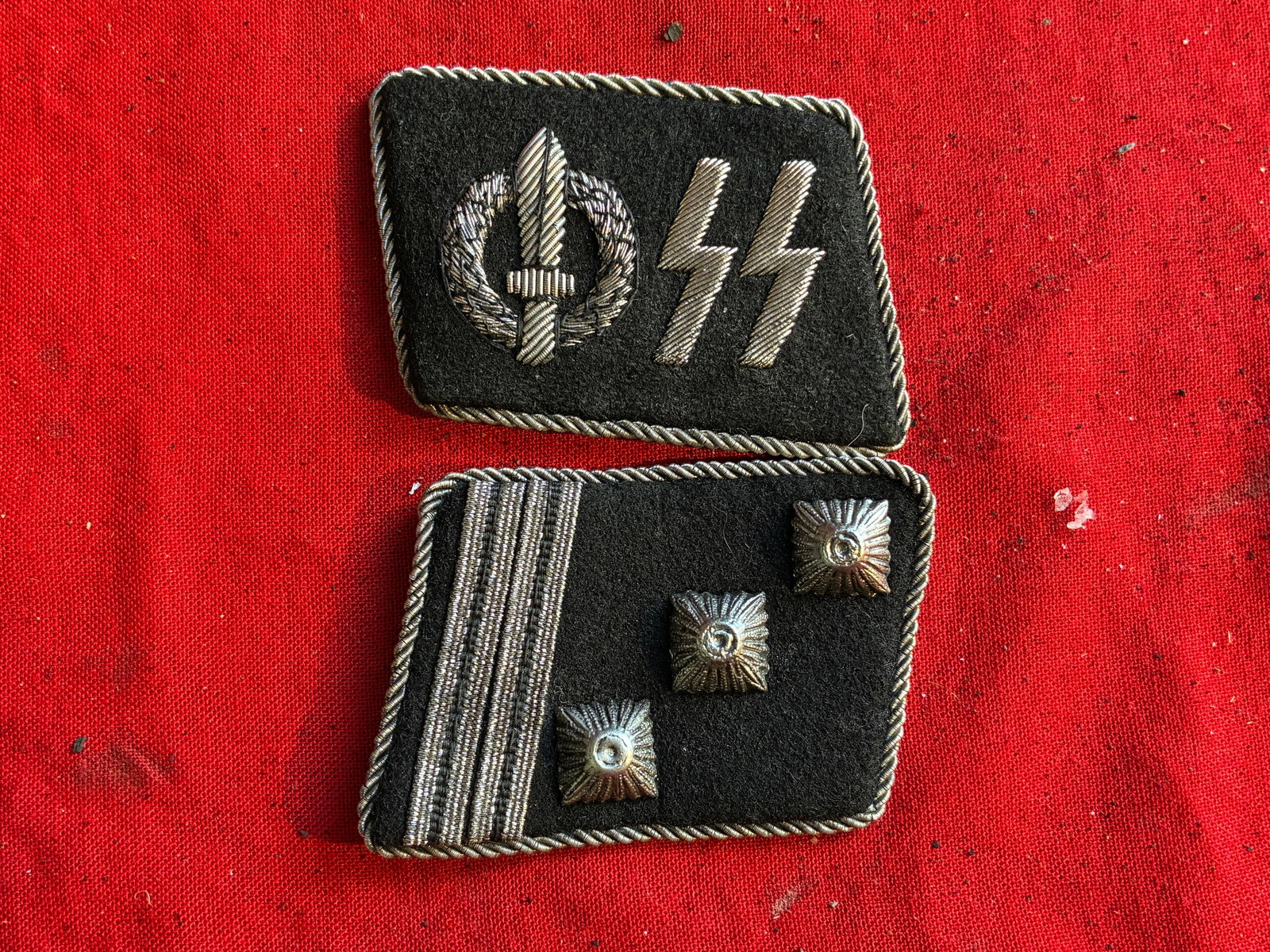 PAIR OF WW2 GERMAN WAFFEN SS COLLAR TABS WITH RZM PAPER TAG: PAIR OF WW2 GERMAN WAFFEN SS COLLAR TABS WITH RZM PAPER TAG. A RARE FIND. SHOWS GOOD WEAR AND USE WITH A BEAUTIFUL OVERALL PATINA. PLEASE VIEW ALL DETAILED PICTURES. A VERY RARE EXAMPLE OF THE TIME PE