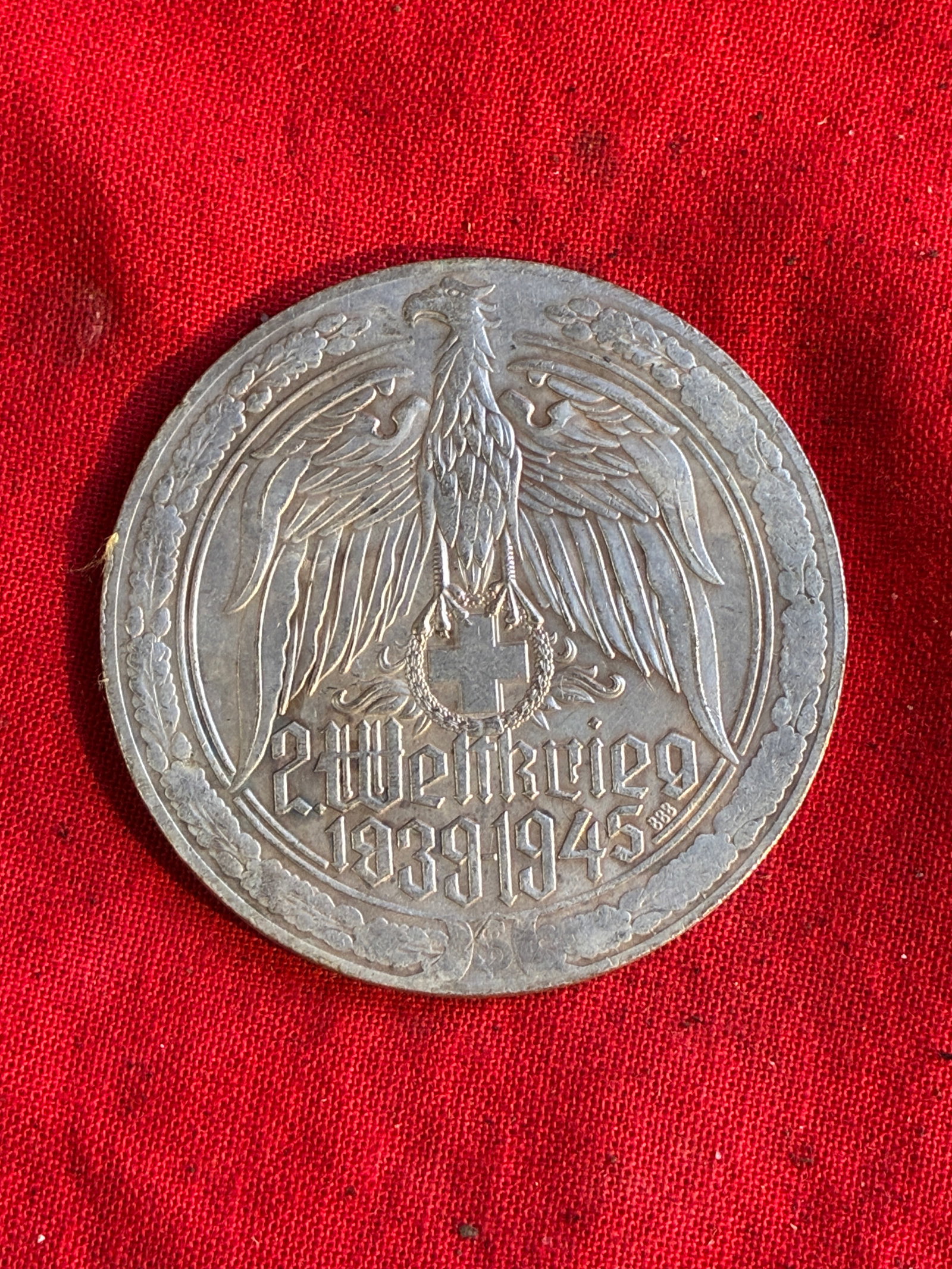 WW2 GERMAN LUFTWAFFE ME 109 FIGHTER PLANE SILVER MEDAL COIN: WW2 GERMAN LUFTWAFFE ME 109 FIGHTER PLANE SILVER MEDAL COIN. A RARE FIND. SHOWS GOOD WEAR AND USE WITH A BEAUTIFUL OVERALL PATINA. PLEASE VIEW ALL DETAILED PICTURES. A VERY RARE EXAMPLE.