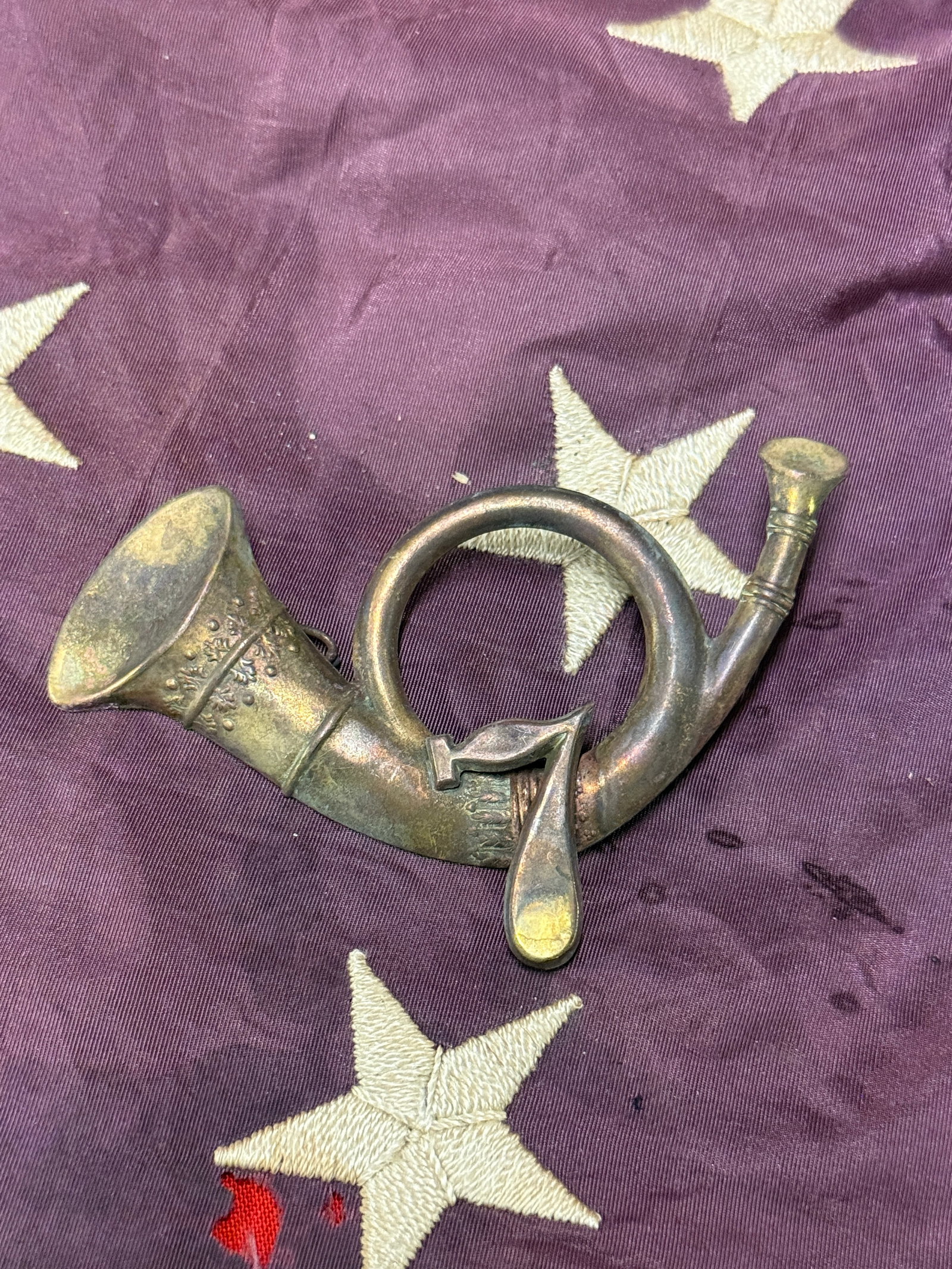 CIVIL WAR UNION 7TH INFANTRY HEADGEAR BADGE INSIGNIA: CIVIL WAR UNION 7TH INFANTRY HEADGEAR BADGE INSIGNIA. A VERY RARE EXAMPLE THAT IS IN MINT OVERALL SHAPE AND CONDITION WITH A BEAUTIFUL OVERALL PATINA. HAS A GREAT LOOK TO IT WITH AN EXCELLENT OVERALL 