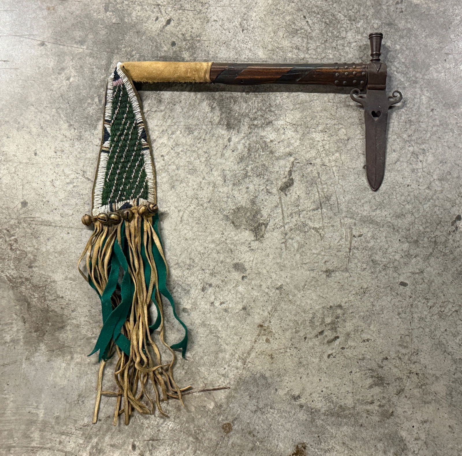 1800'S NATIVE AMERICAN CHOCTAW INDIANS SPONTOON PIPE TACKED BLEEDING HEART TOMAHAW WITH BEADED DROP: 1800'S NATIVE AMERICAN CHOCTAW INDIANS SPONTOON PIPE TACKED BLEEDING HEART TOMAHAW WITH BEADED DROP. A VERY RARE FIND. BEAUTIFULLY TACKED THROUGHOUT THE TOMAHAWK. SHOWS GOOD WEAR AND USE WITH A BEAUTI