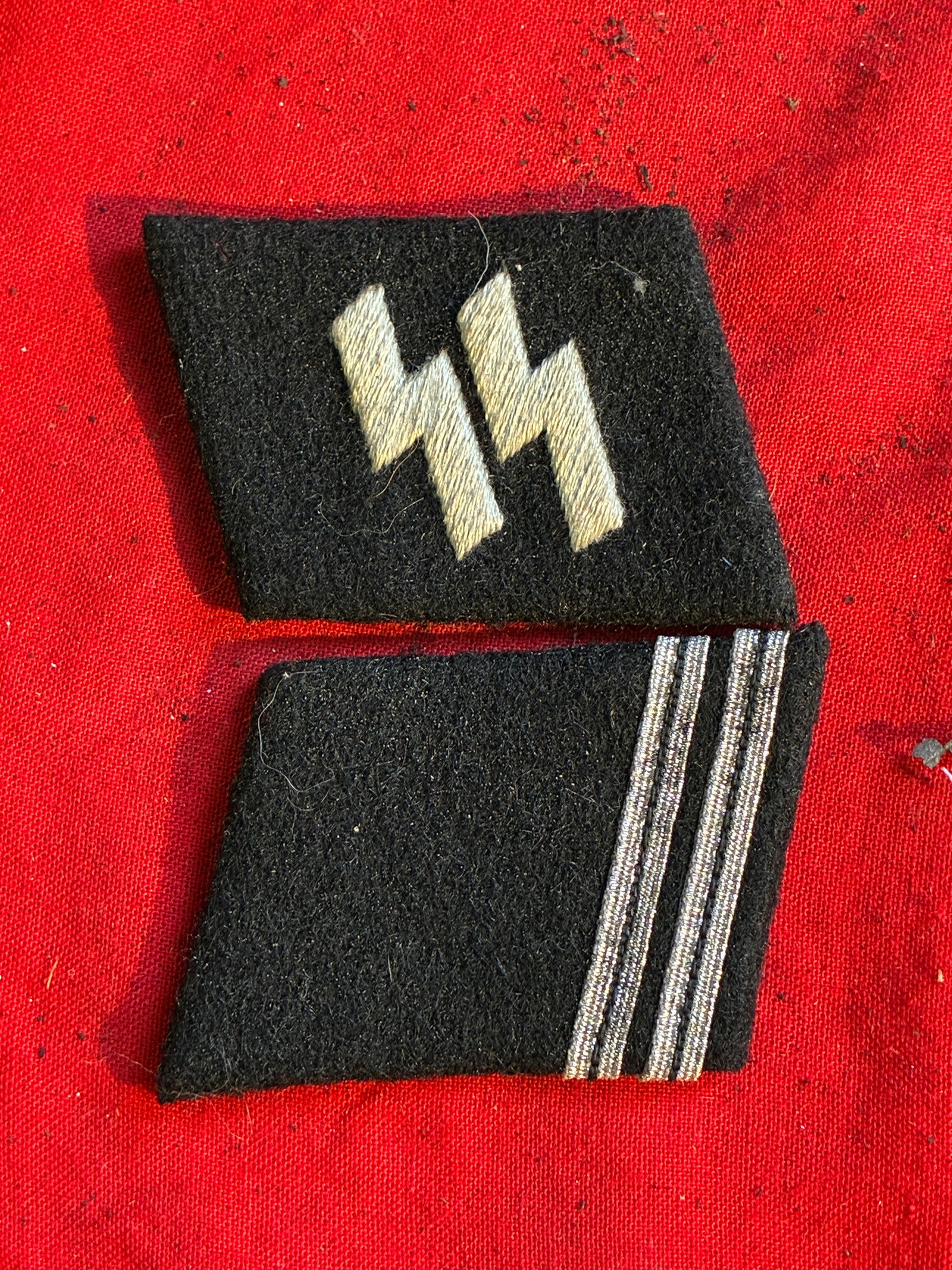 Waffen-SS Collar Tabs SS-Obersturmbannführer TO SS-Mann With RZM Paper Tag: Waffen-SS Collar Tabs SS-Obersturmbannführer TO SS-Mann With RZM Paper Tag. Comes as a set. It is in mint overall shape and condition with a beautiful overall patina. Shows good wear and use. Please 