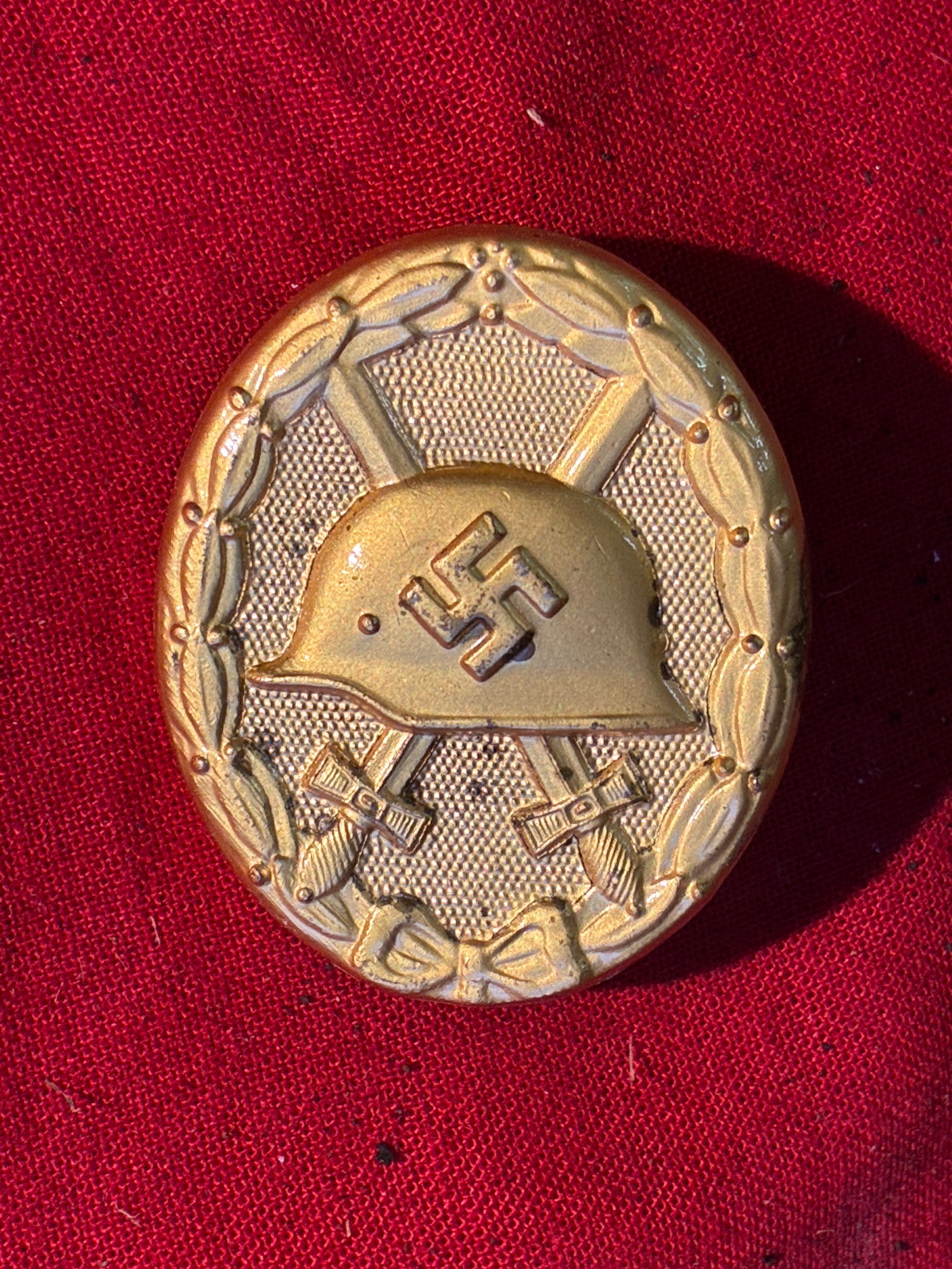 WWII GERMAN RARE MAKER MARKED30 GOLD WOUND BADGE, 1939: WWII GERMAN RARE MAKER MARKED 30 GOLD WOUND BADGE, 1939. A very rare find. Shows good wear and use with a beautiful overall patina. Maker marked 30 on the reverse. Please view all detailed pictures. A