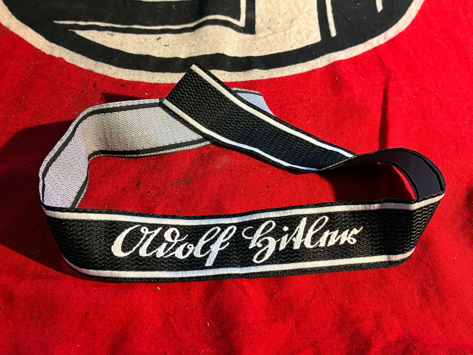 GERMAN WWII WAFFEN SS LSSAH ADOLF HITLER CUFF TITLE: GERMAN WWII WAFFEN SS LSSAH ADOLF HITLER CUFF TITLE. A rare find. A German WWII type Waffen SS Panzer Division Leibstandarte Adolf Hitler Cuff Title. The item features silver wire bullion embroidery o