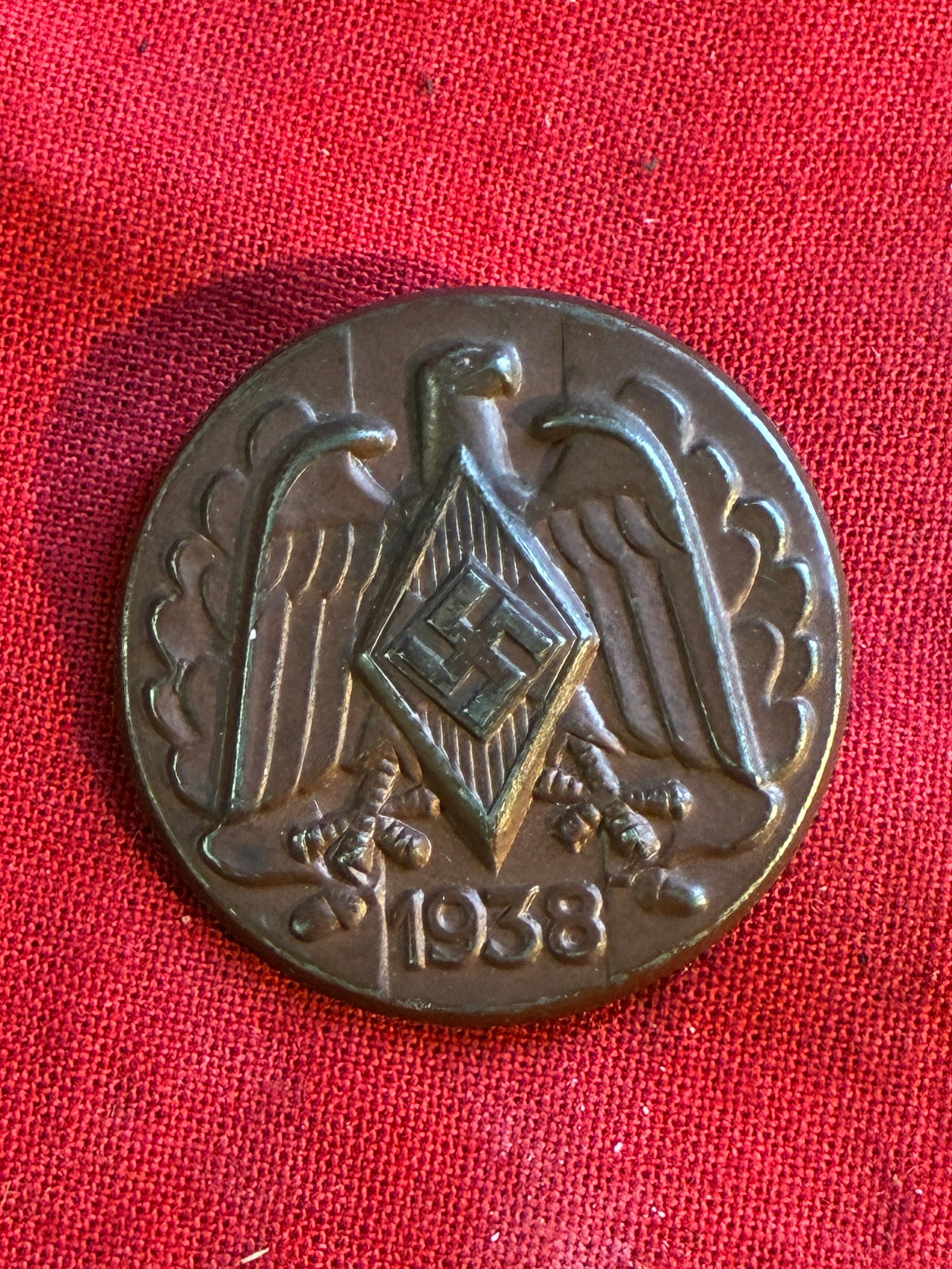 WW2 German Hitler Youth 1938 Day Badge Tinnie: WW2 German Hitler Youth 1938 Day Badge Tinnie. Uncommon 1938 Tombac tinnie for the HJ. Measures 30mm in diameter. Pin-back fastener. The Hitler Youth (German: Hitlerjugend, often abbreviated as HJ) wa