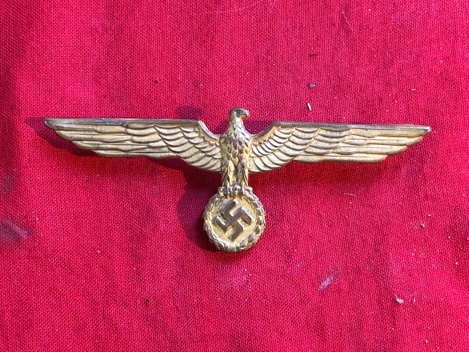 WWII German Kreigsmarine (NAVY) METAL OFFICER’S BREAST EAGLE: WWII German Kreigsmarine (NAVY) METAL OFFICER’S BREAST EAGLE. German Naval uniforms and headgear were based on traditional designs that date back to the creation of the Prussian Navy in 1848, and al