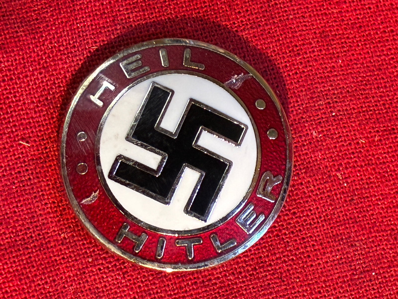 WW2 German Adolf Hitler 1933 Enameled Lapel Party Badge By RZM: WW2 German Adolf Hitler 1933 Enameled Lapel Party Badge By RZM. SHOWS GOOD WEAR AND USE WITH A BEAUTIFUL OVERALL PATINA. PLEASE VIEW ALL DETAILED PICTURES. A SCARCE EXAMPLE OF THE TIME PERIOD.
